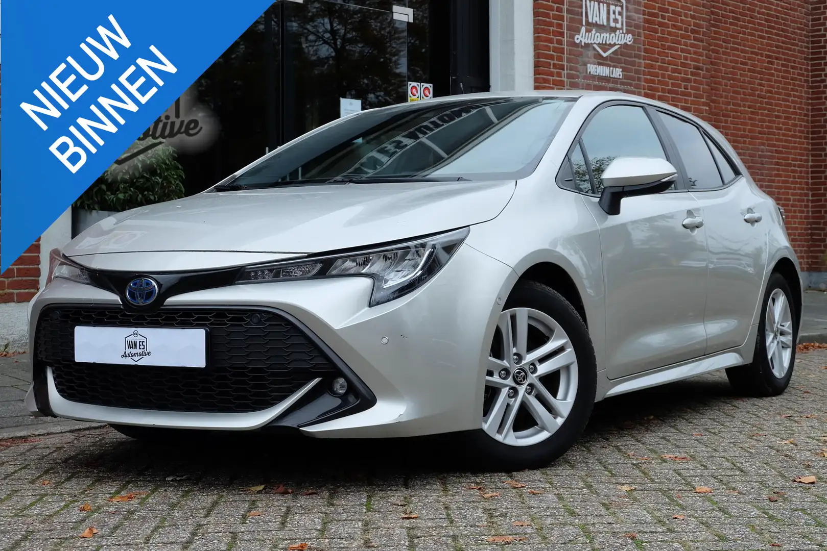 Toyota Corolla 1.8 Hybrid Business / Garantie t/m '30 / 1ste eig. Grijs - 1