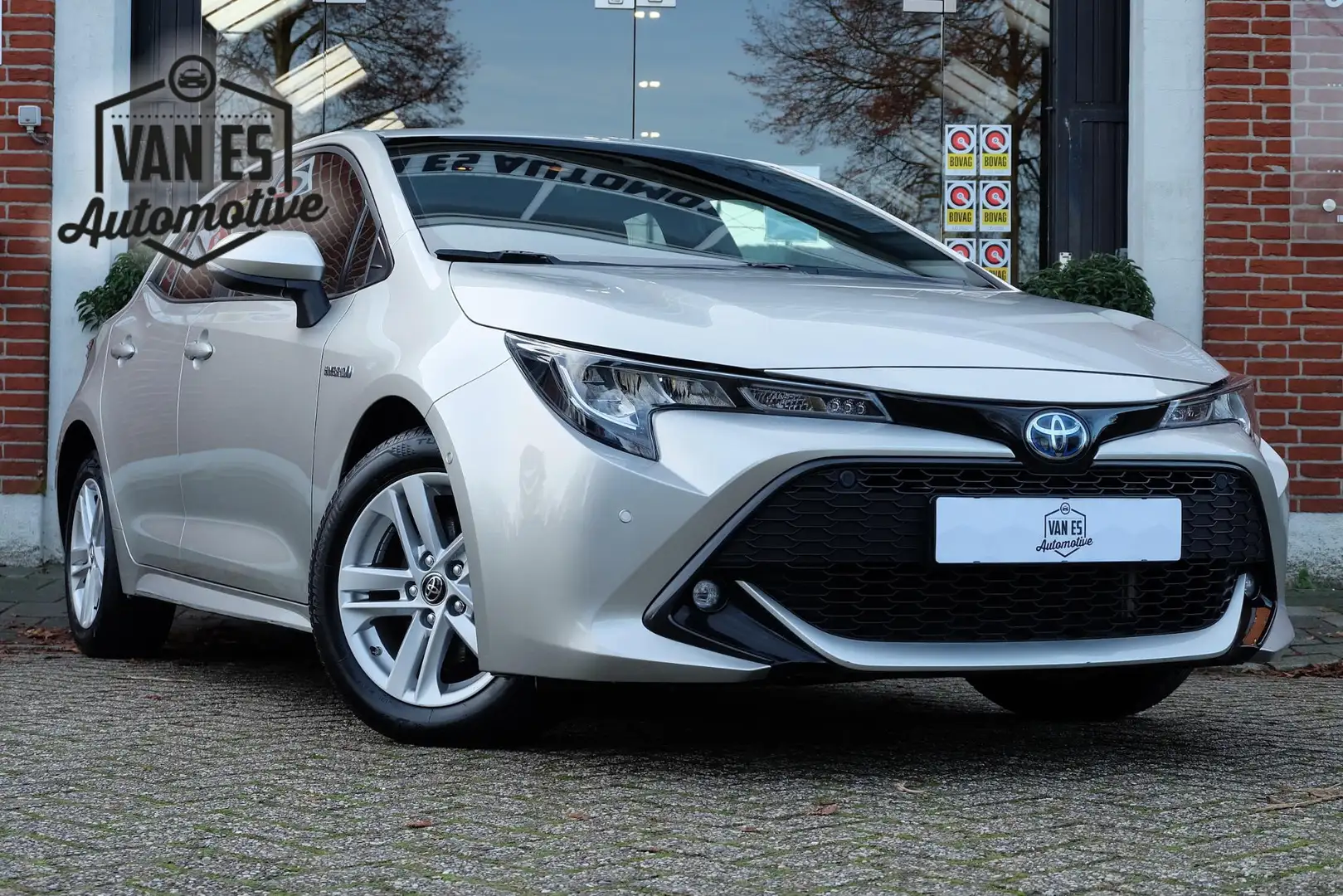 Toyota Corolla 1.8 Hybrid Business / Garantie t/m '30 / 1ste eig. Grijs - 1