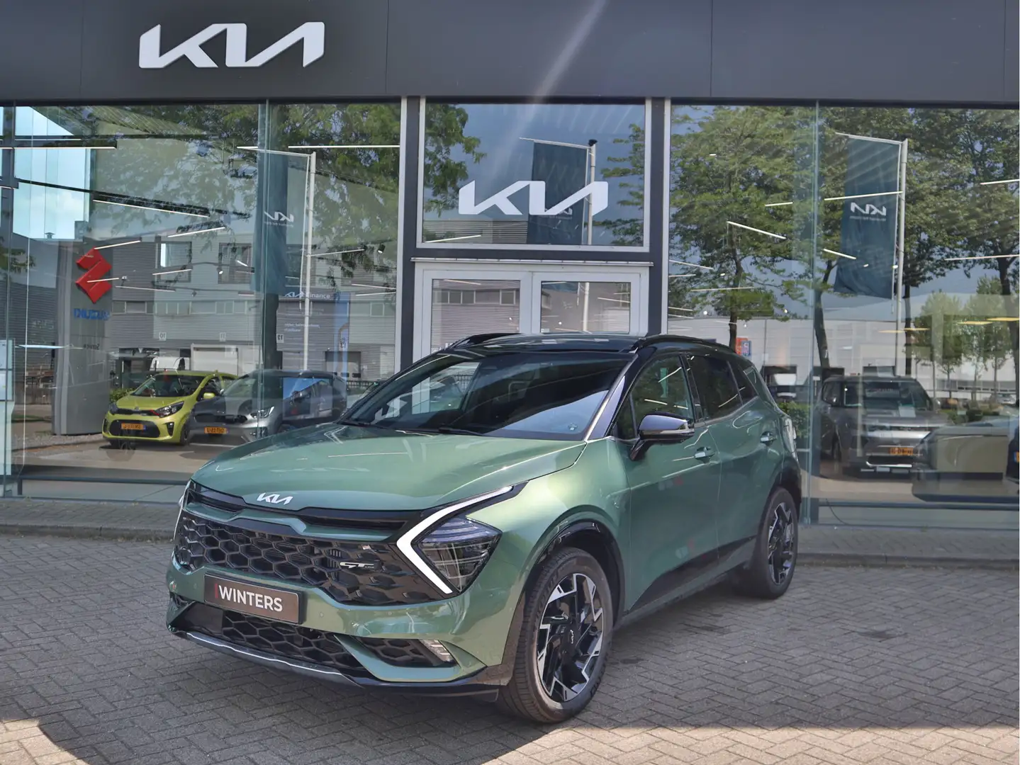 Kia Sportage 1.6 T-GDi Plug-in Hybrid AWD GT-PlusLine | Navigat Groen - 1