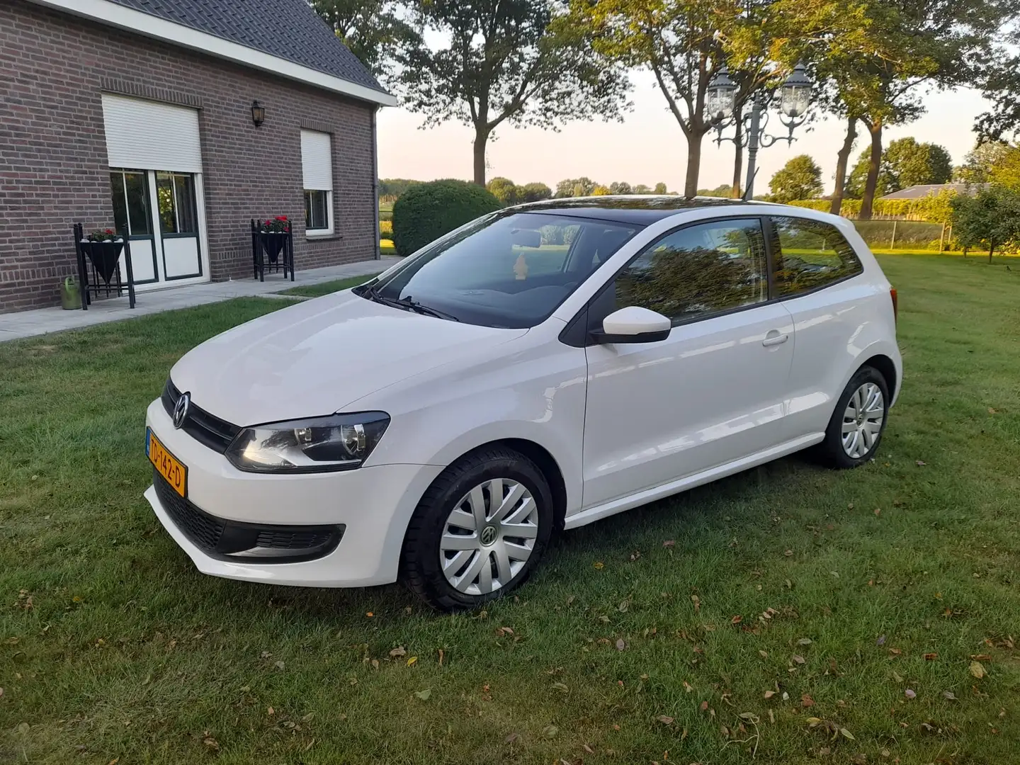 Volkswagen Polo 1.2-12V Comfortline met lichte schade Wit - 1