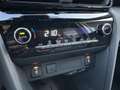 Toyota Yaris Cross 1.5 Hybrid 130pk Dynamic Comfort dodehoekdetectie Gris - thumbnail 36