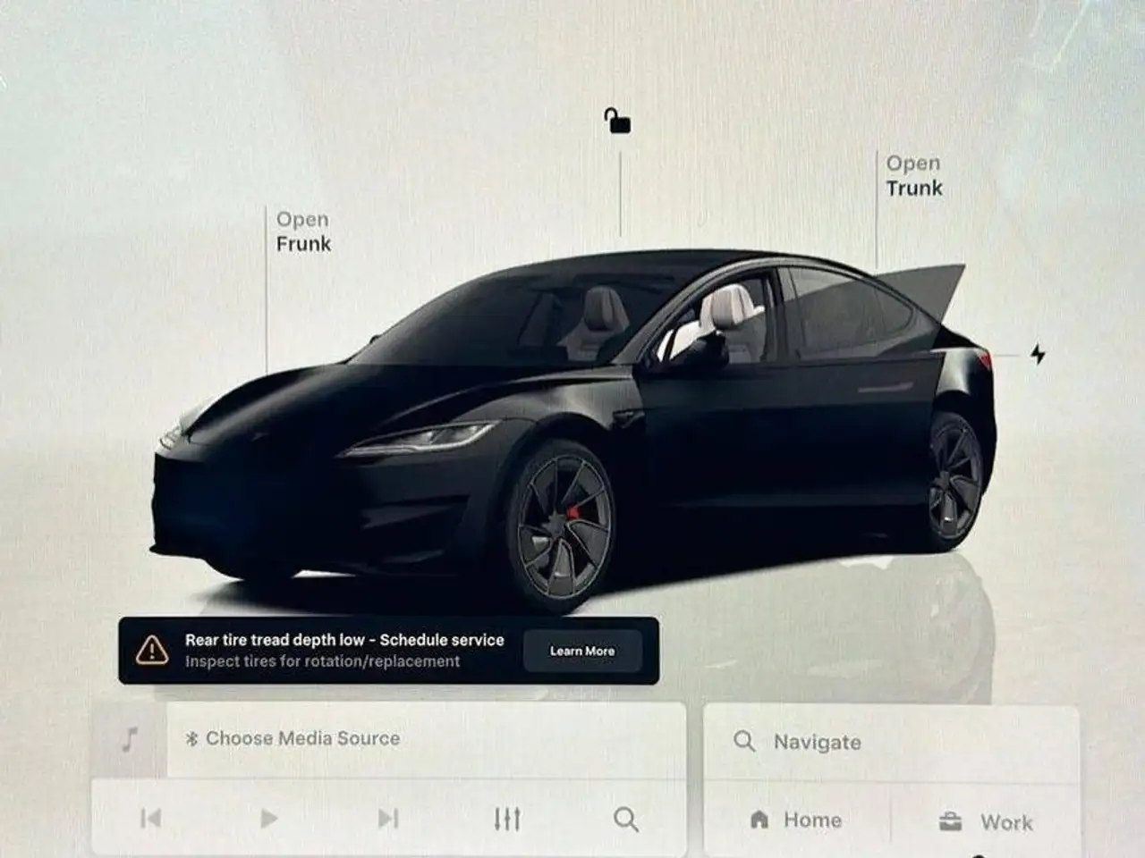 Tesla Model 3 photo Tesla Model 3