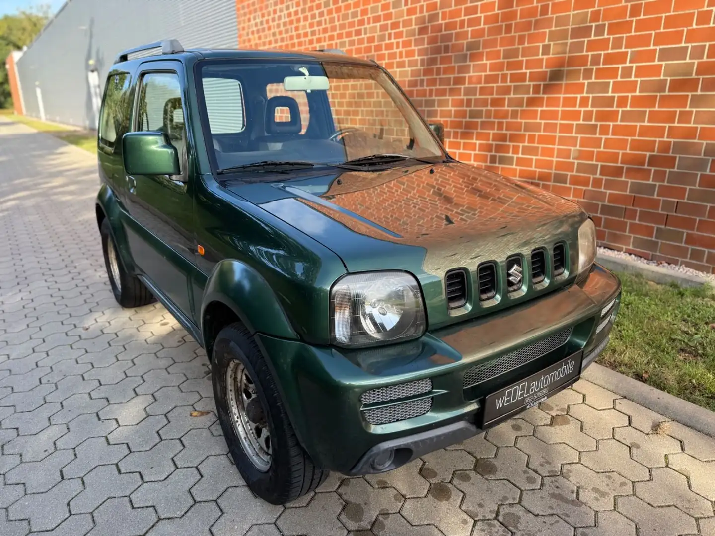 Suzuki Jimny 1.3 4WD Club-AUTO-KLIMA-AHK-SHZ-TÜV27 Grün - 1