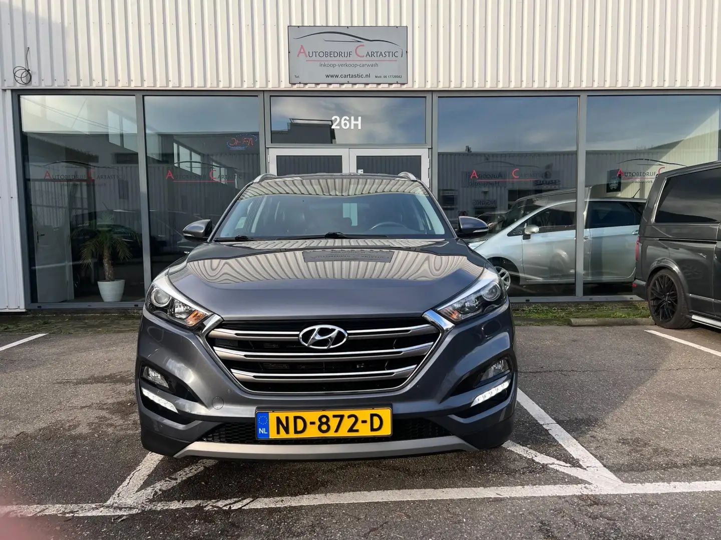 Hyundai TUCSON 1.6 GDi Go! LEER | NAVI | STOELVERWARM. | CLIMA | Grijs - 2