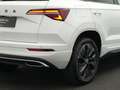 Skoda Karoq 1.5 TSI 150 pk DSG Sportline Business | Trekhaak | Wit - thumbnail 19