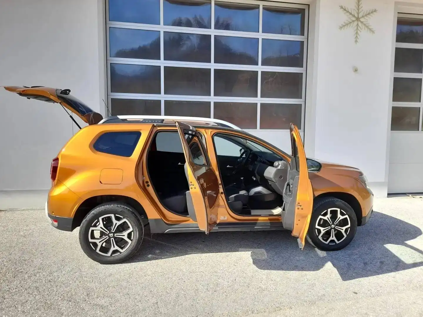 Dacia Duster 1.5 dCi 110 S&S 4WD Prestige Orange - 1