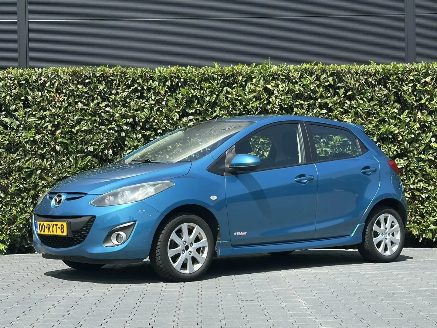 Mazda 2 1.3 GT-M Line, NL AUTO, NAP LOGISCH, ECC-AIRCO, ST Blauw - 1