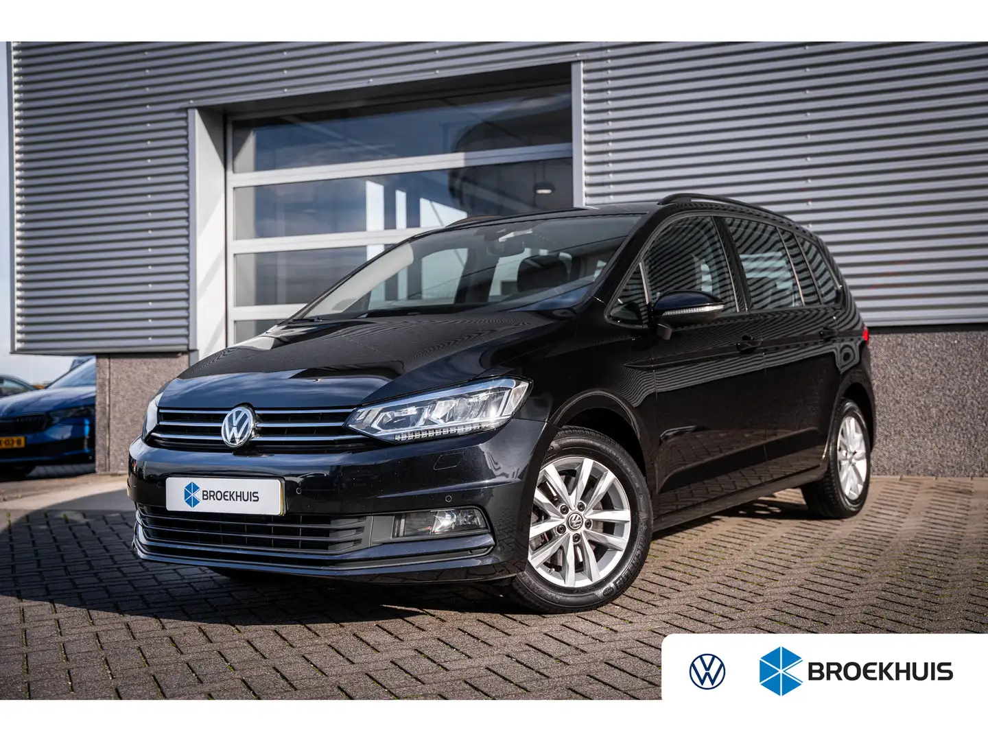 Volkswagen Touran 1.5 TSI Comfortline 7p | Cruise control adaptief | Zwart - 1