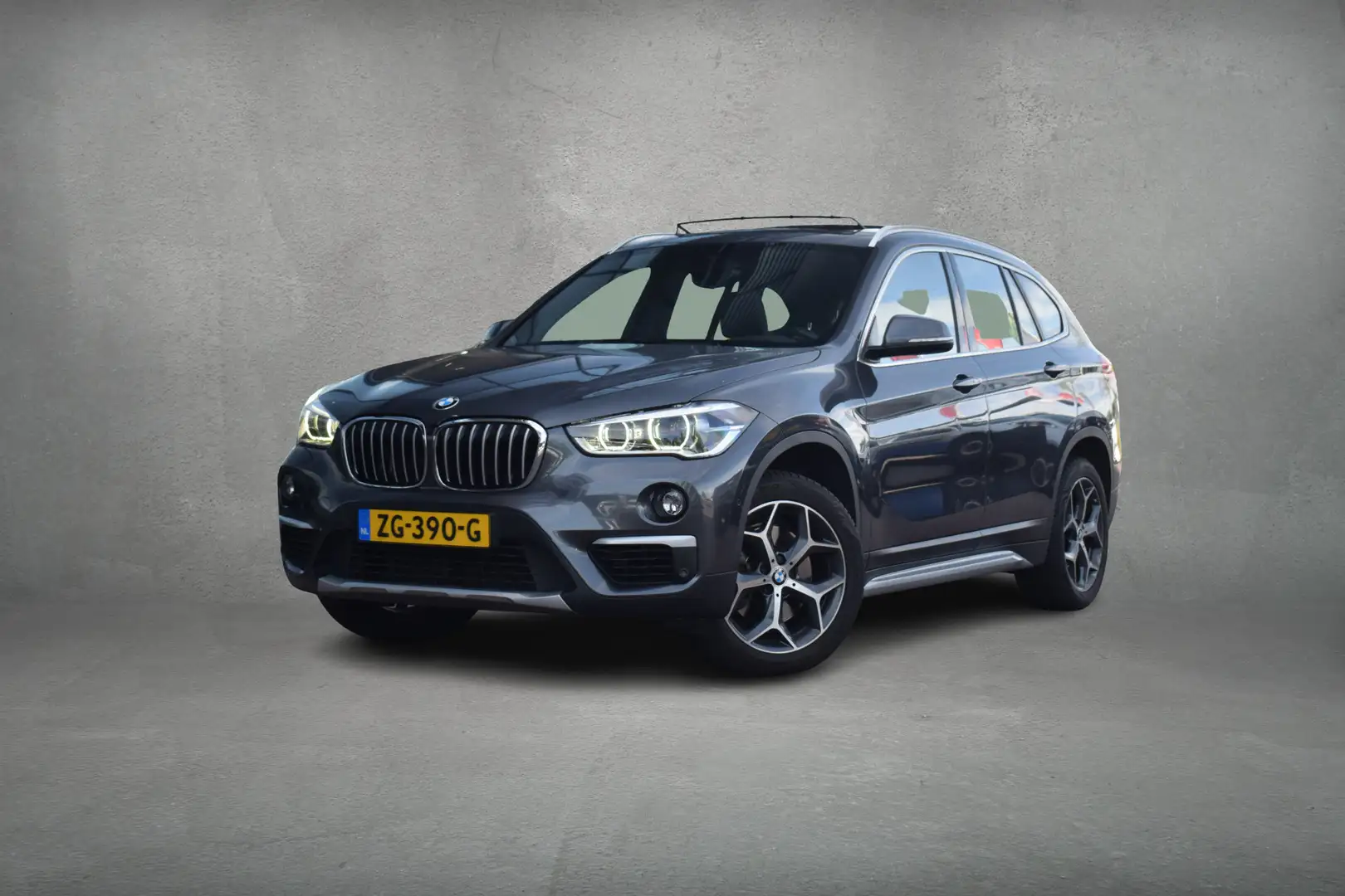 BMW X1 sDrive20i High Executive | Pano | Leer | Trekhaak Gris - 2