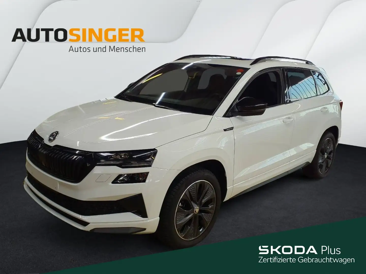 Skoda Karoq Sportline TSI DSG 4x4 *AHK*PANO*MATRIX*NAV Weiß - 1