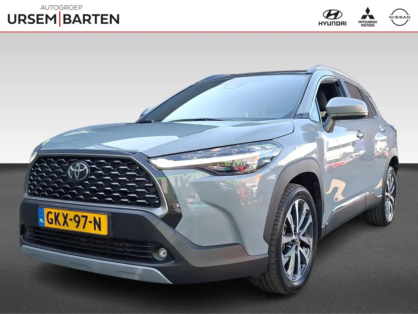 Toyota Corolla Cross Hybrid 140 Business Plus Grijs - 1
