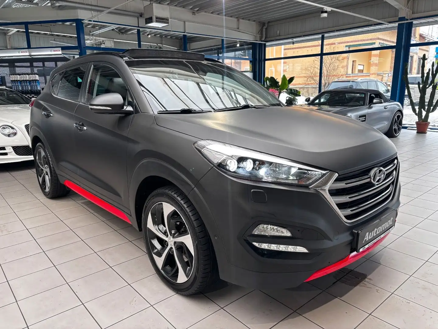 Hyundai TUCSON 1.6 Premium 4WD*LED*Navi*Sitzh*Pano* Rot - 1