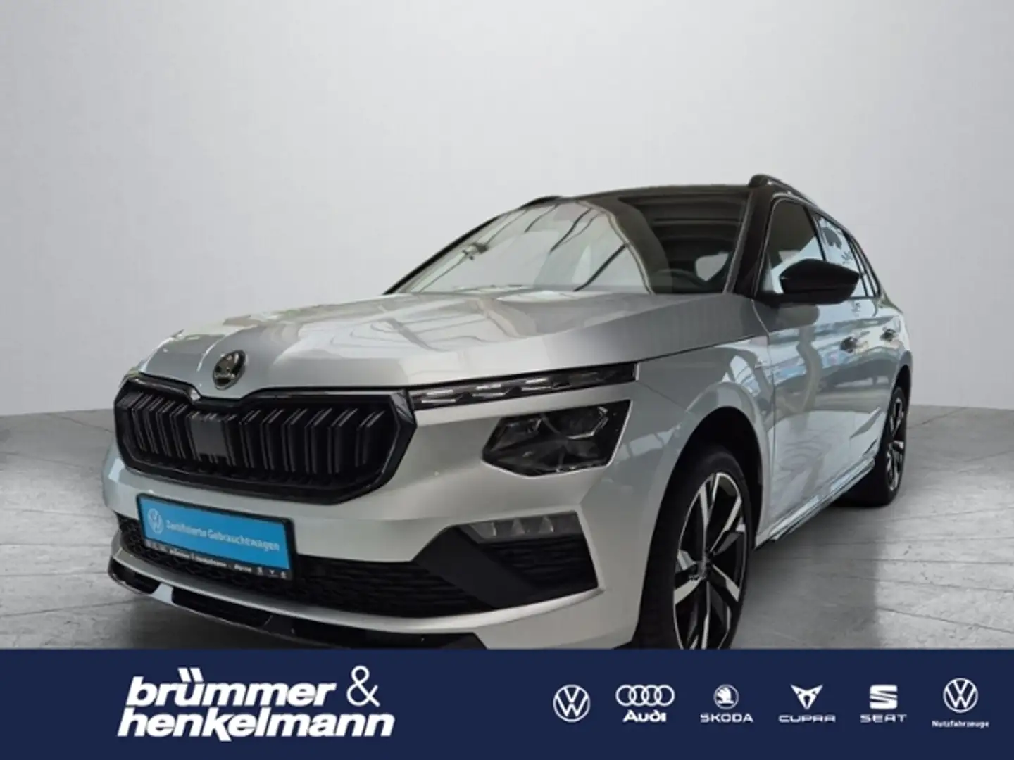 Skoda Kamiq Monte Carlo1.5 TSI DSG +AHK+NAVI+APP+CT+PANO+R-Ka Silber - 1