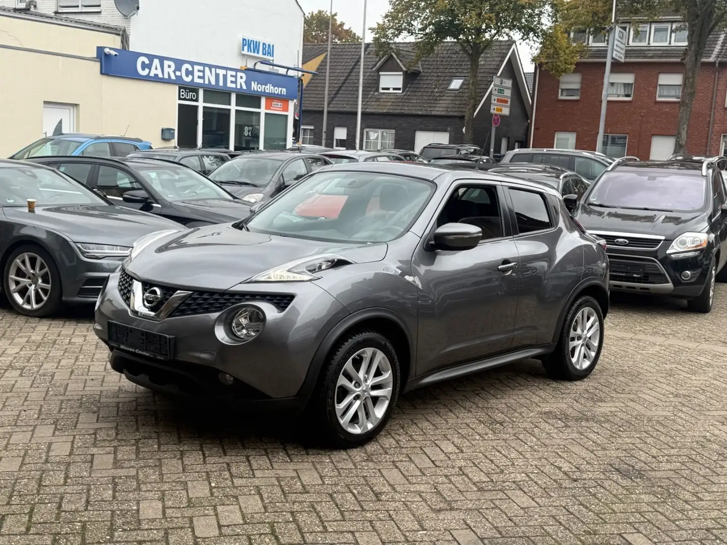 Nissan Juke *KMAER*NAVI*SHZ*LED*MFL*LMF*** Grau - 1