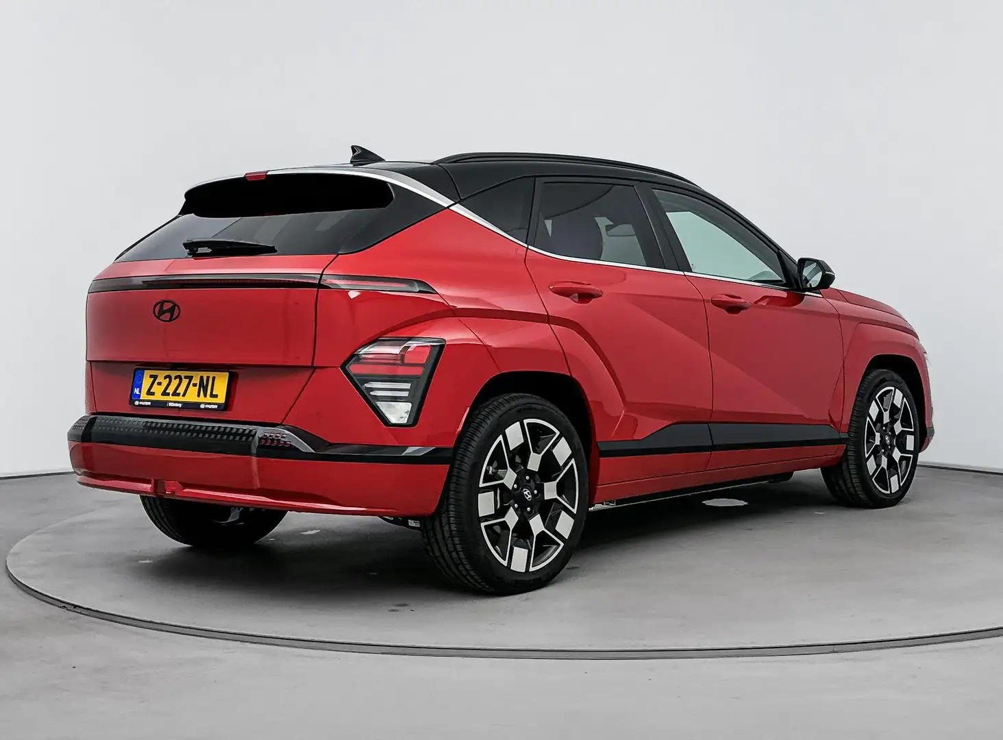 Hyundai KONA Electric Premium 65.4 kWh | Leer | Trekhaak | Stoe Rouge - 2