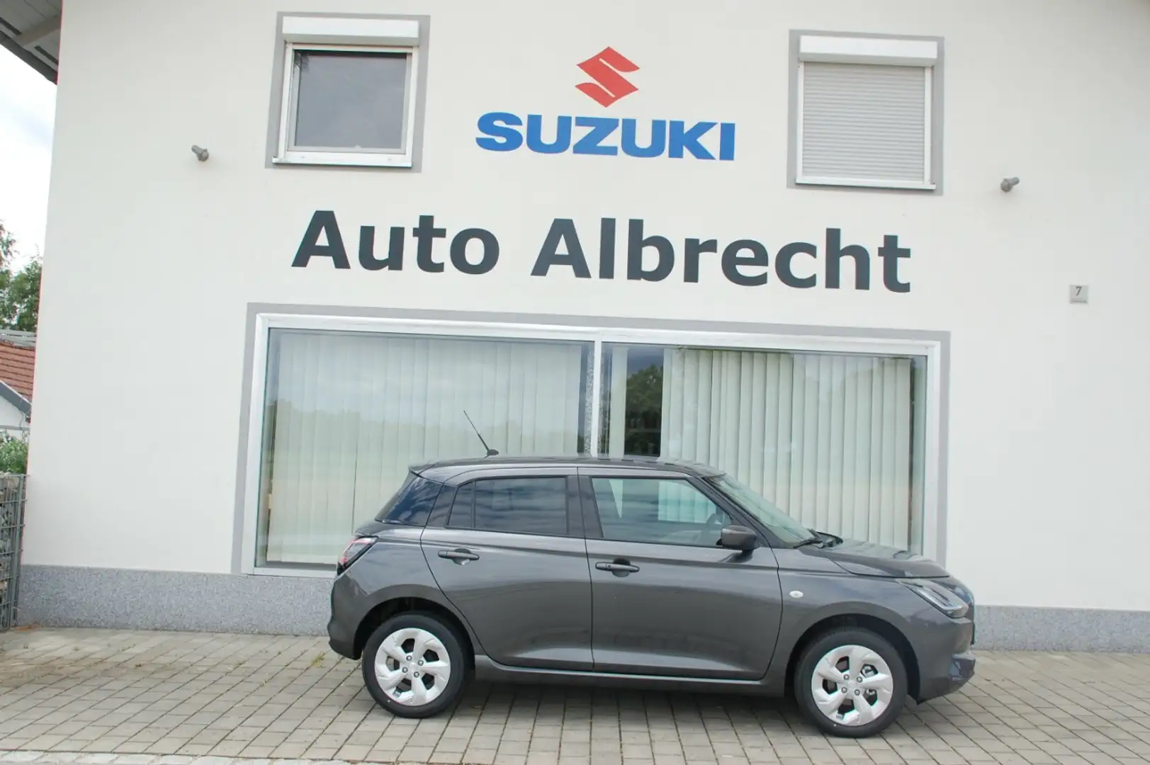 Suzuki Swift 1.2 Dualjet Hybrid 61 kW AllGrip Comfort Grau - 1