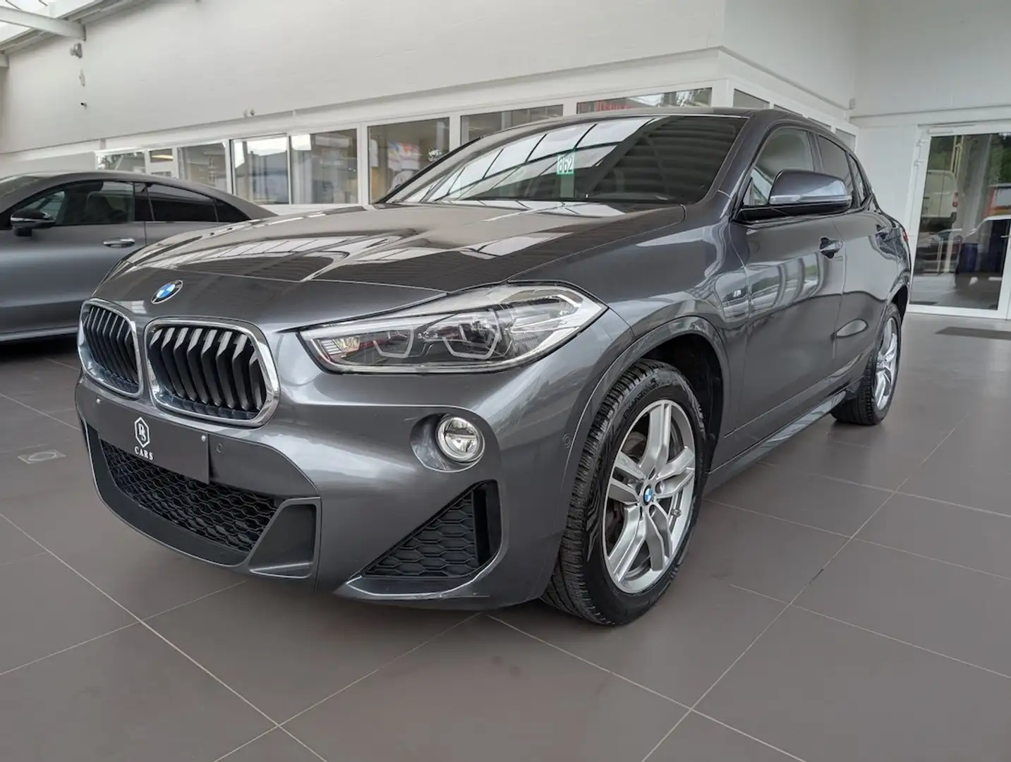 BMW X2 1.5i *** GARANTIE + PACK M + LED + CUIR + GPS *** Gris - 1
