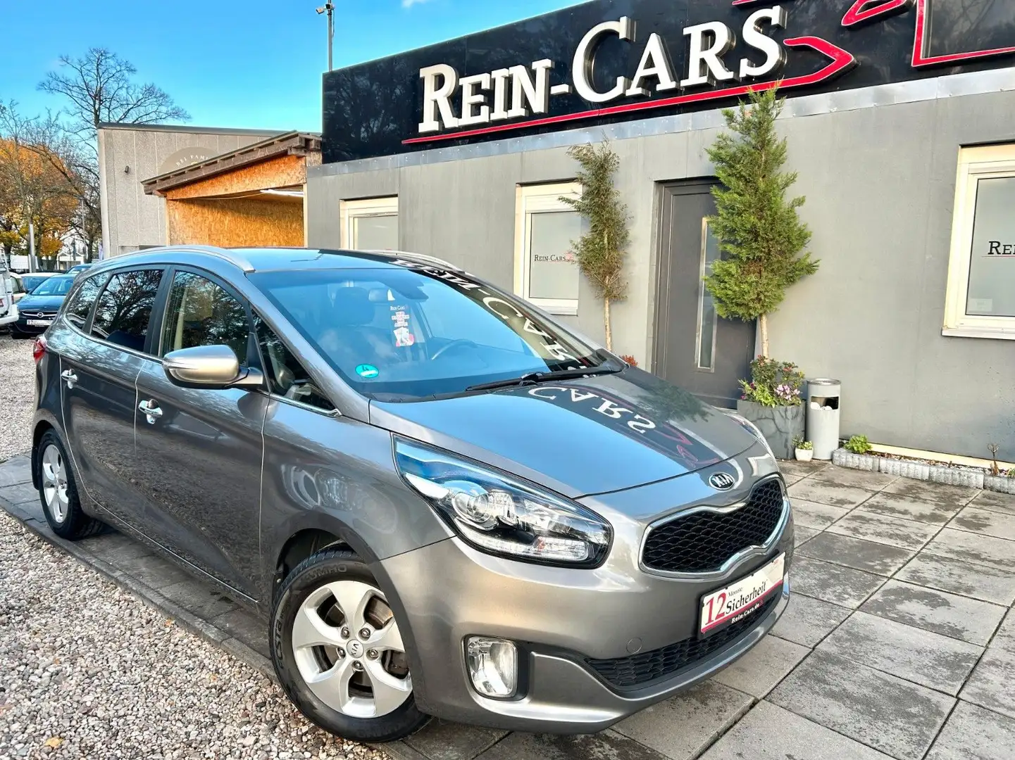 Kia Carens Spirit 1,6/I.HAND/KAMERA/NAVI/LHZ/MFL Zilver - 1