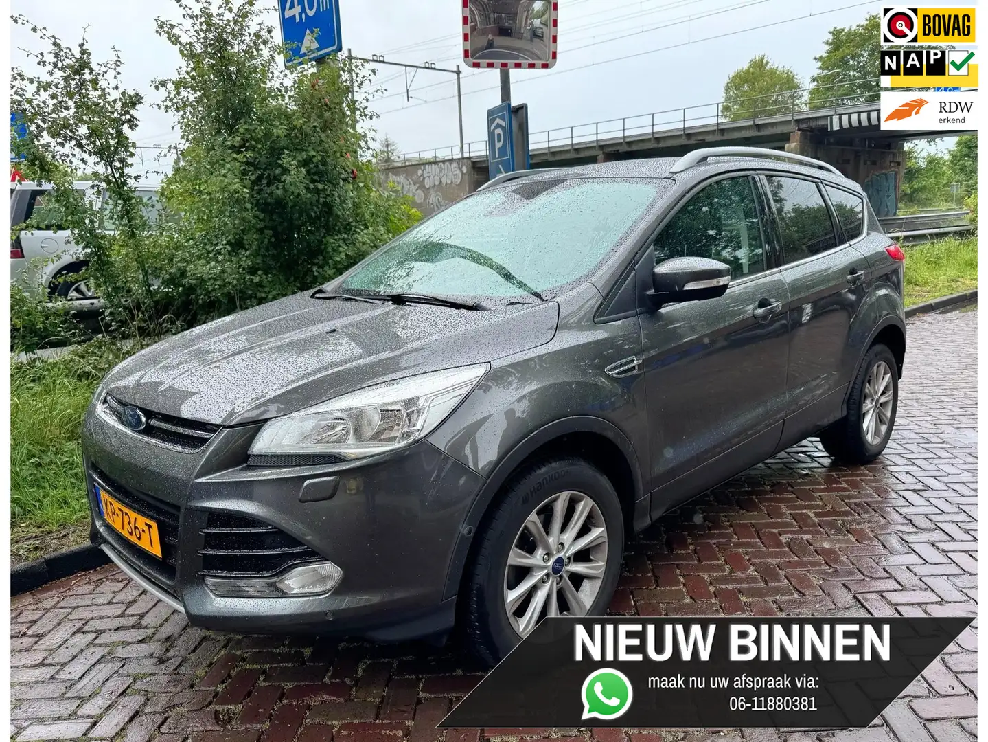 Ford Kuga 1.5 Titanium | VAN 2e EIGENAAR | TREKHAAK | Grijs - 1