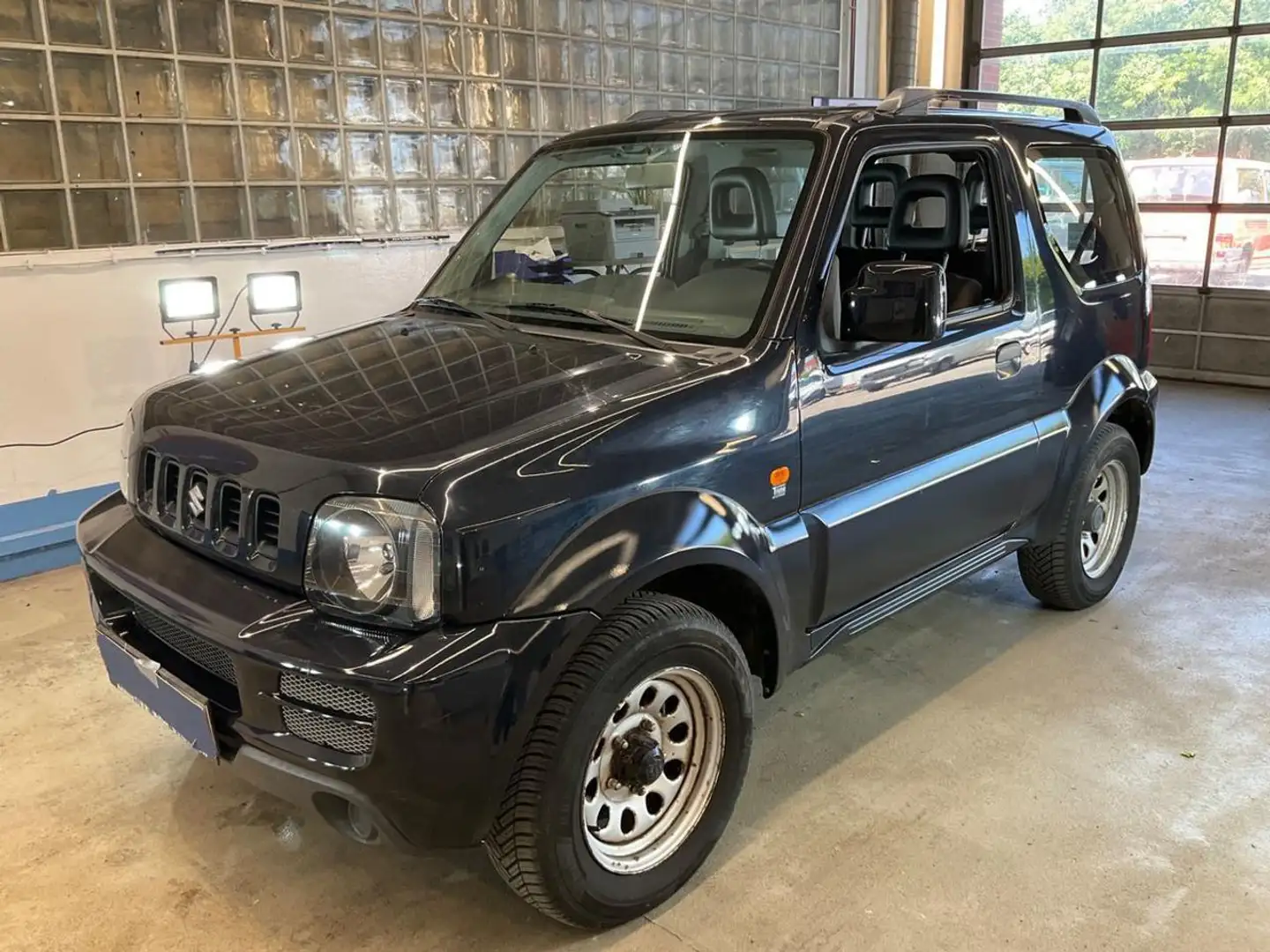 Suzuki Jimny 1.3i 16V cat 4WD JLX Nero - 1