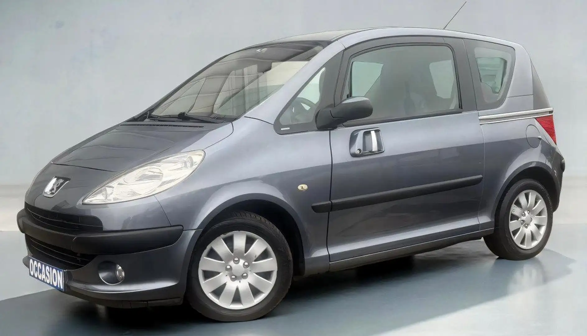 Peugeot 1007 1.4i 75ch (5 cv) 8V - BVM5 - 3 Portes - Dolce %2B  Grijs - 1