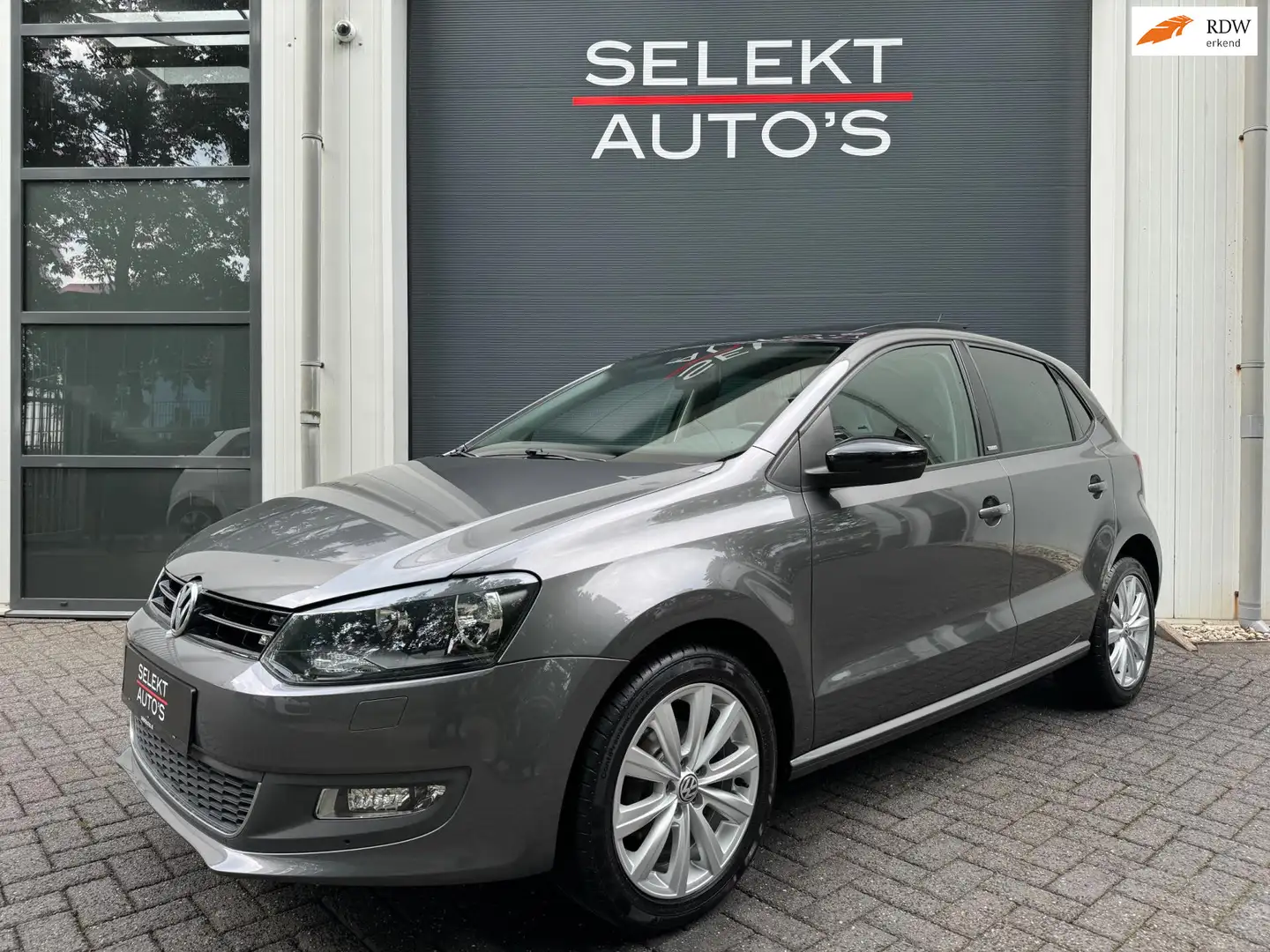 Volkswagen Polo 1.4-16V Style Panoramadak/Airco/Cruise/Navigatie/A Gris - 1