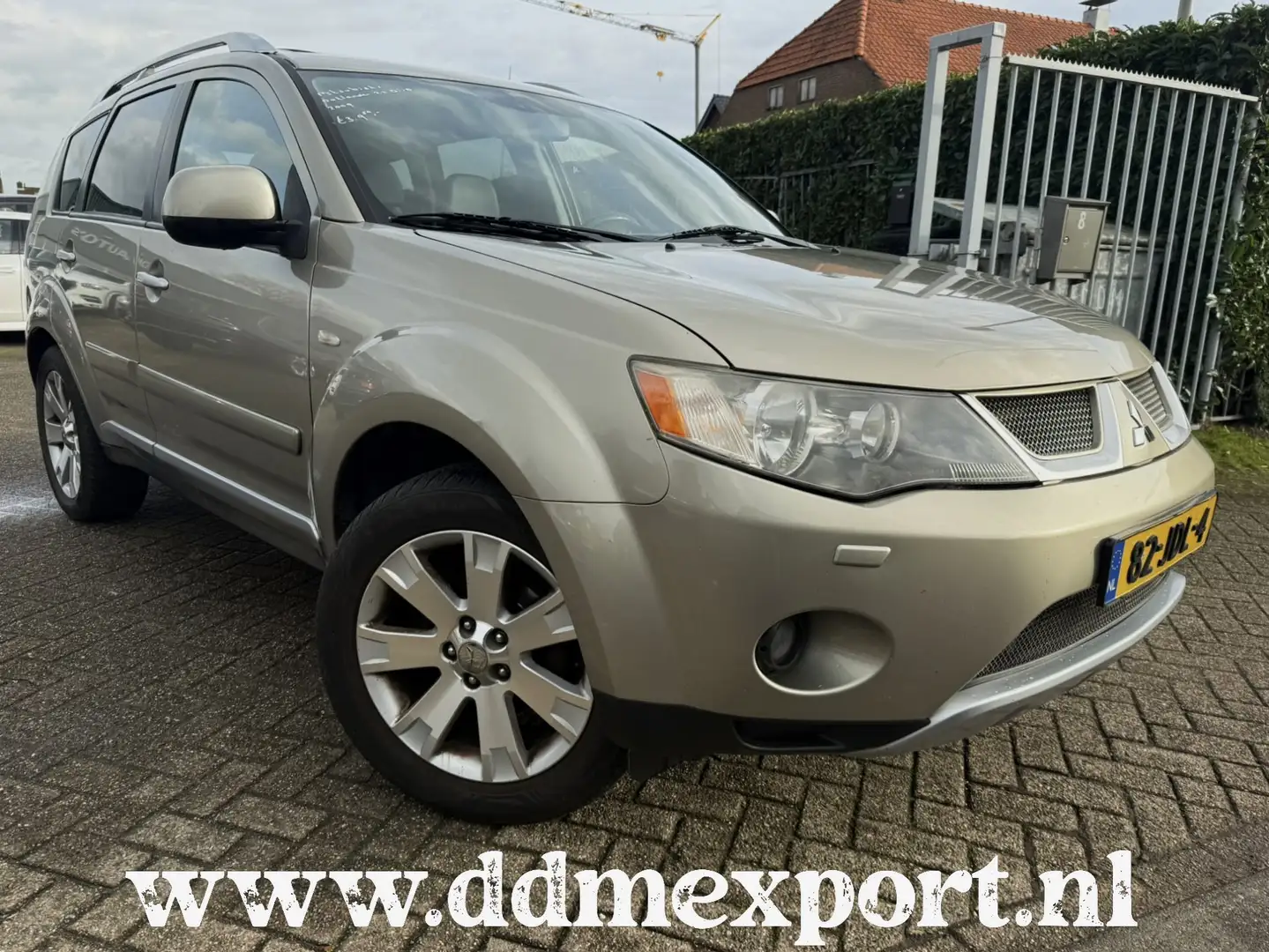 Mitsubishi Outlander DI-D 4X4 NAVI/LMV/AIRCO/PDC/PANO Beige - 1