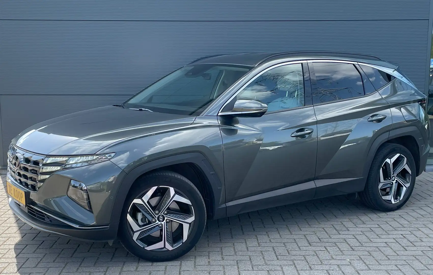 Hyundai TUCSON 1.6 T-GDi HEV 4WD Shine Groen - 1