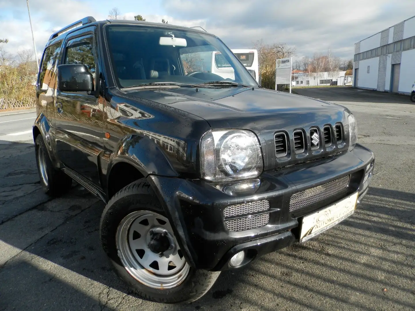 Suzuki Jimny Comfort Lim.NR. 42*AHK*Klima*ALU Schwarz - 1
