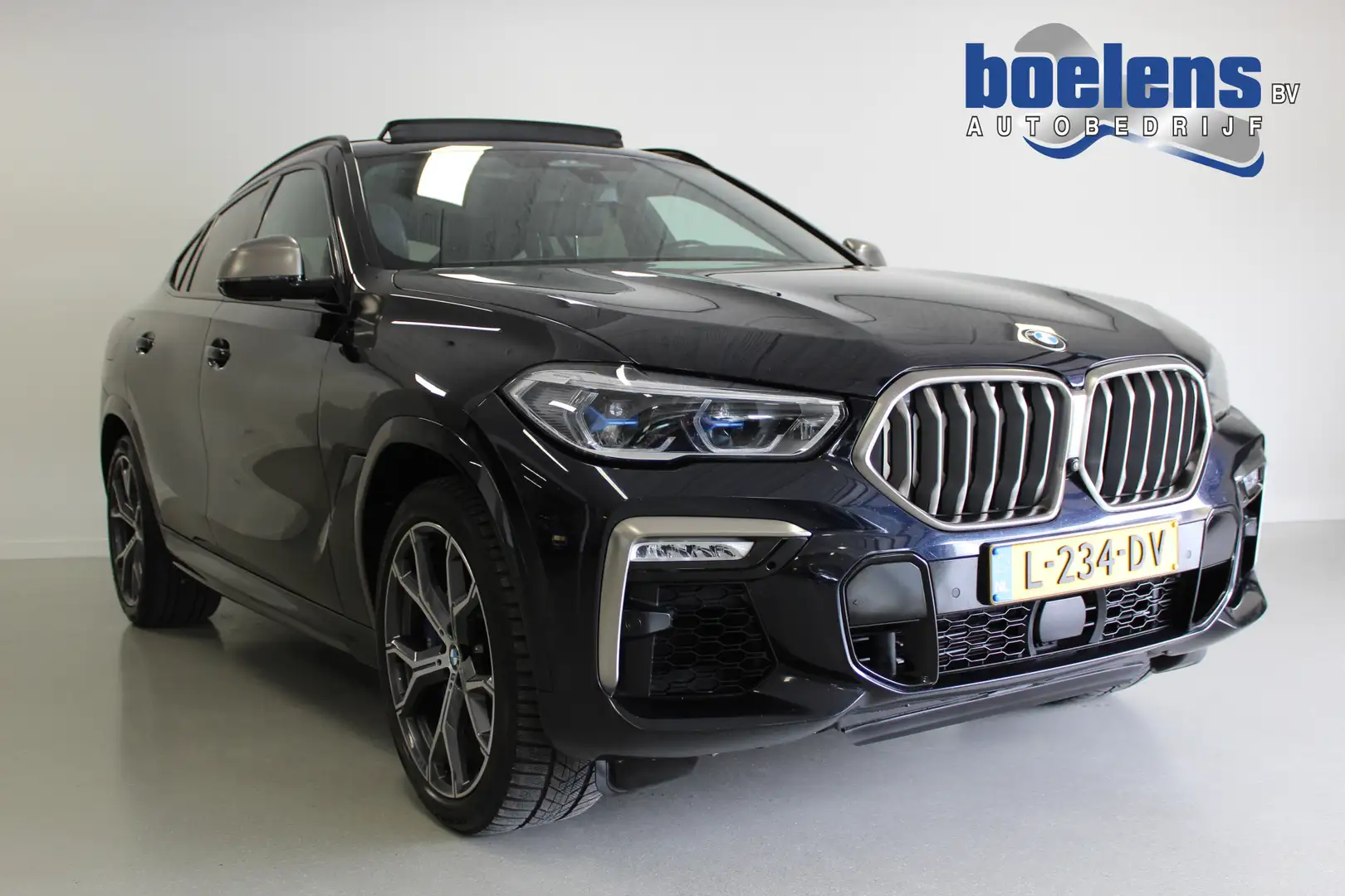 BMW X6 M50d High Executive | 400PK | ACC | HUD | TRHAAK | Zwart - 1