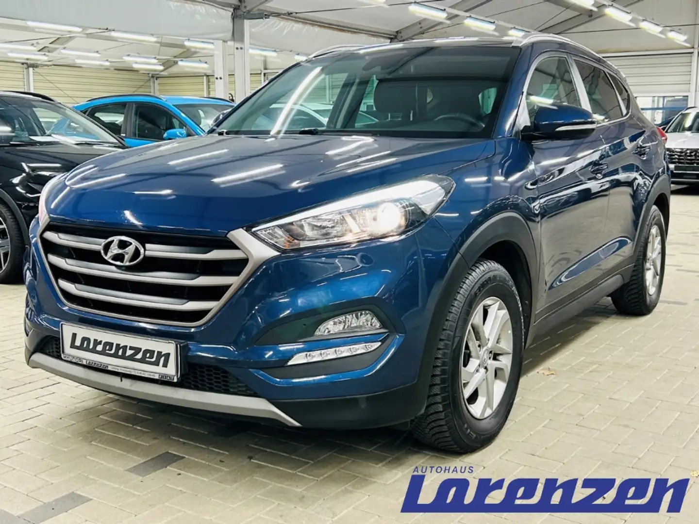 Hyundai TUCSON ADVANTAGE 1.6 GDi Turbo 7-DCT 4WD Navi Mehrzonenkl plava - 1