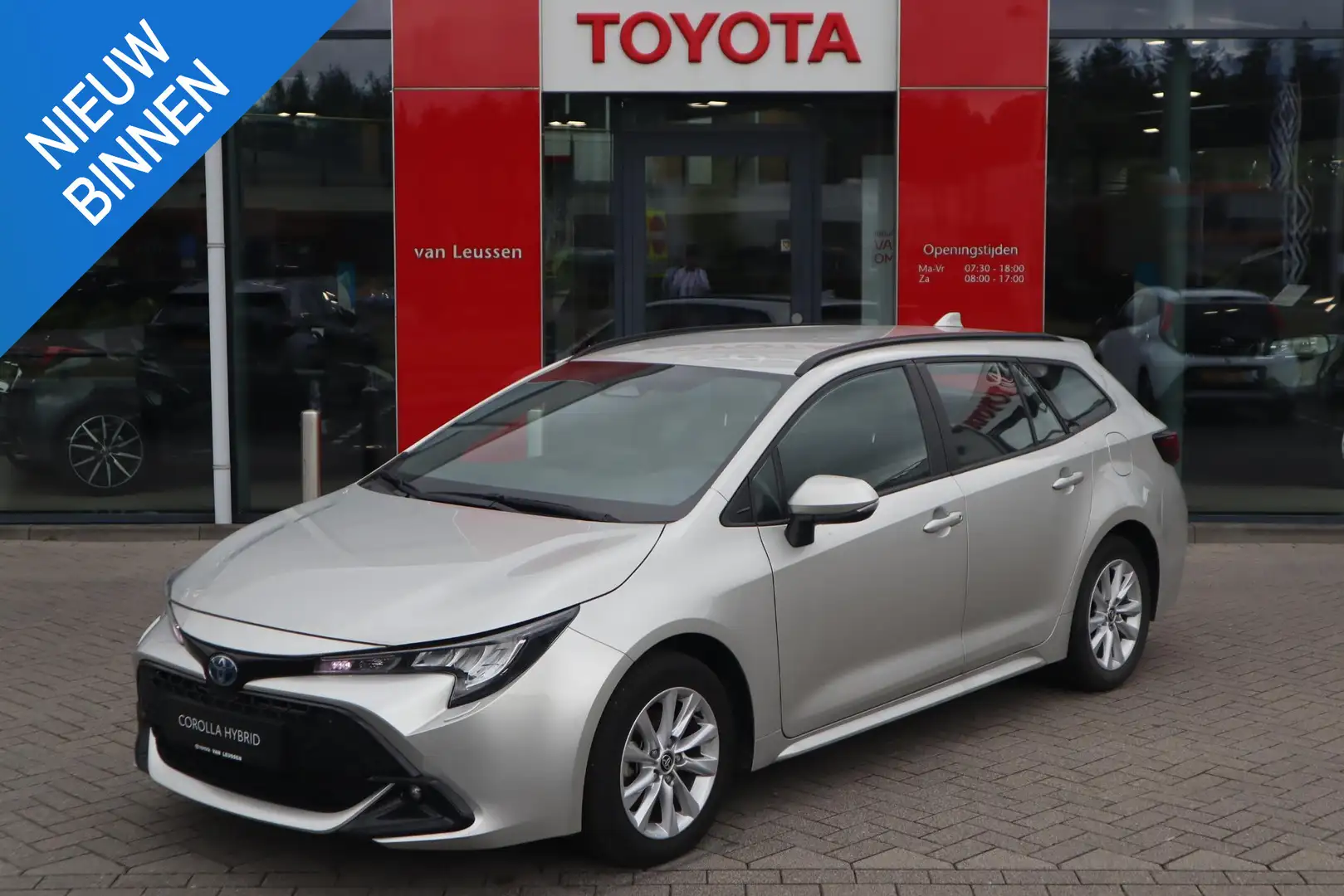 Toyota Corolla Touring Sports HYBRID 140 DYNAMIC APPLE/ANDROID NA Grijs - 1