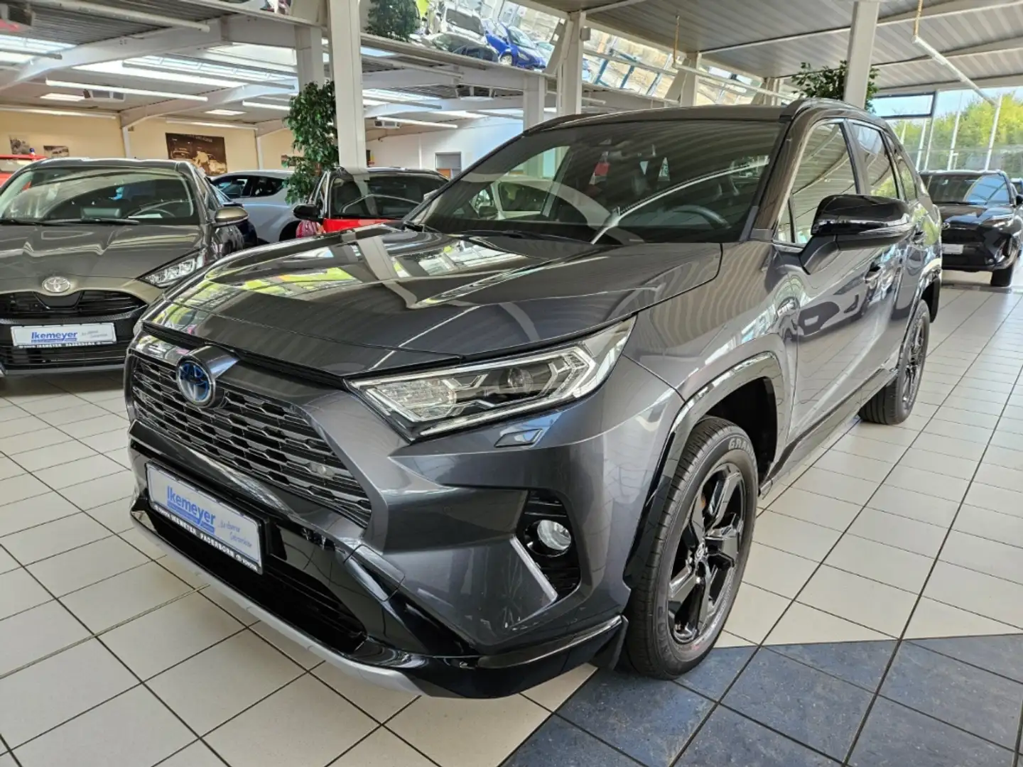 Toyota RAV 4 2.5 Hybrid Style elektr. Heckklappe Teilleder Sitz Grau - 1