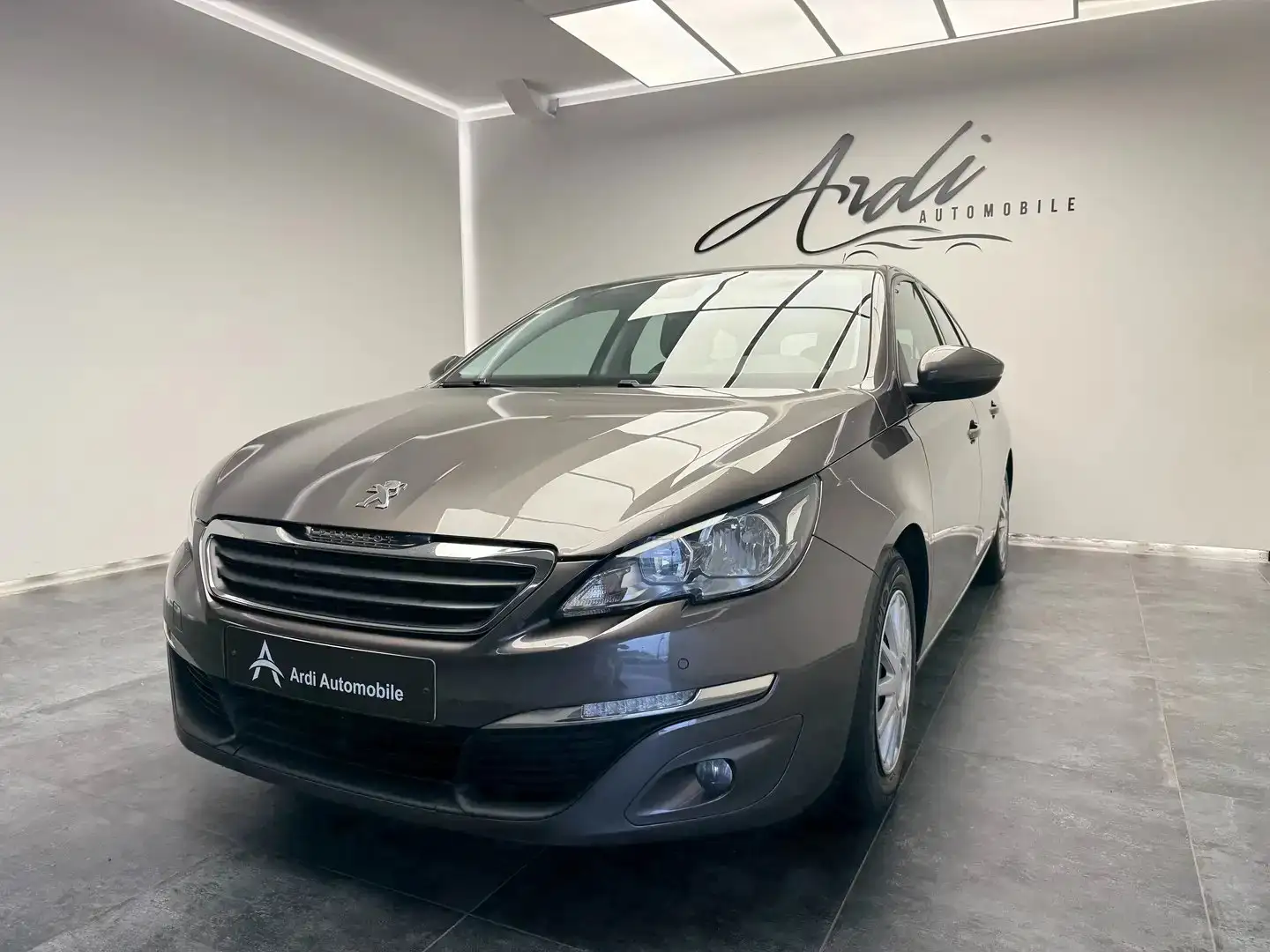 Peugeot 308 SW 1.6 HDi *GPS*AIRCO*1ER PROPRIETAIRE*GARANTIE* Gris - 1