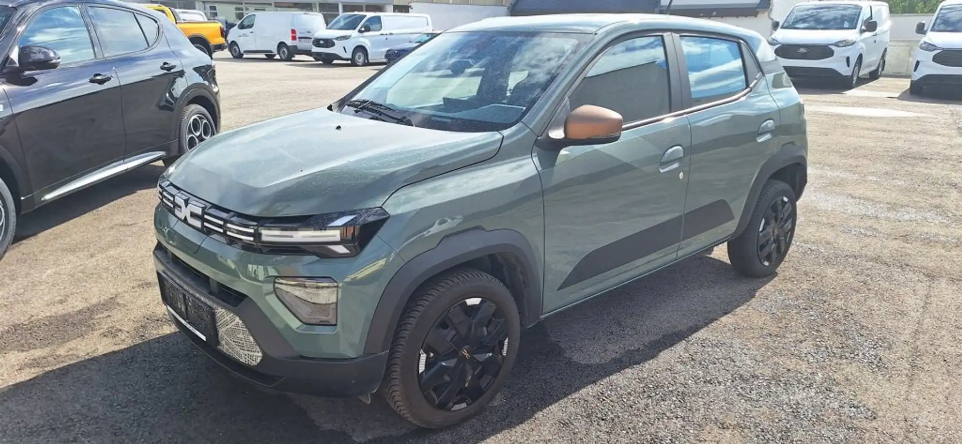 Dacia Spring 65 Extreme Grün - 1