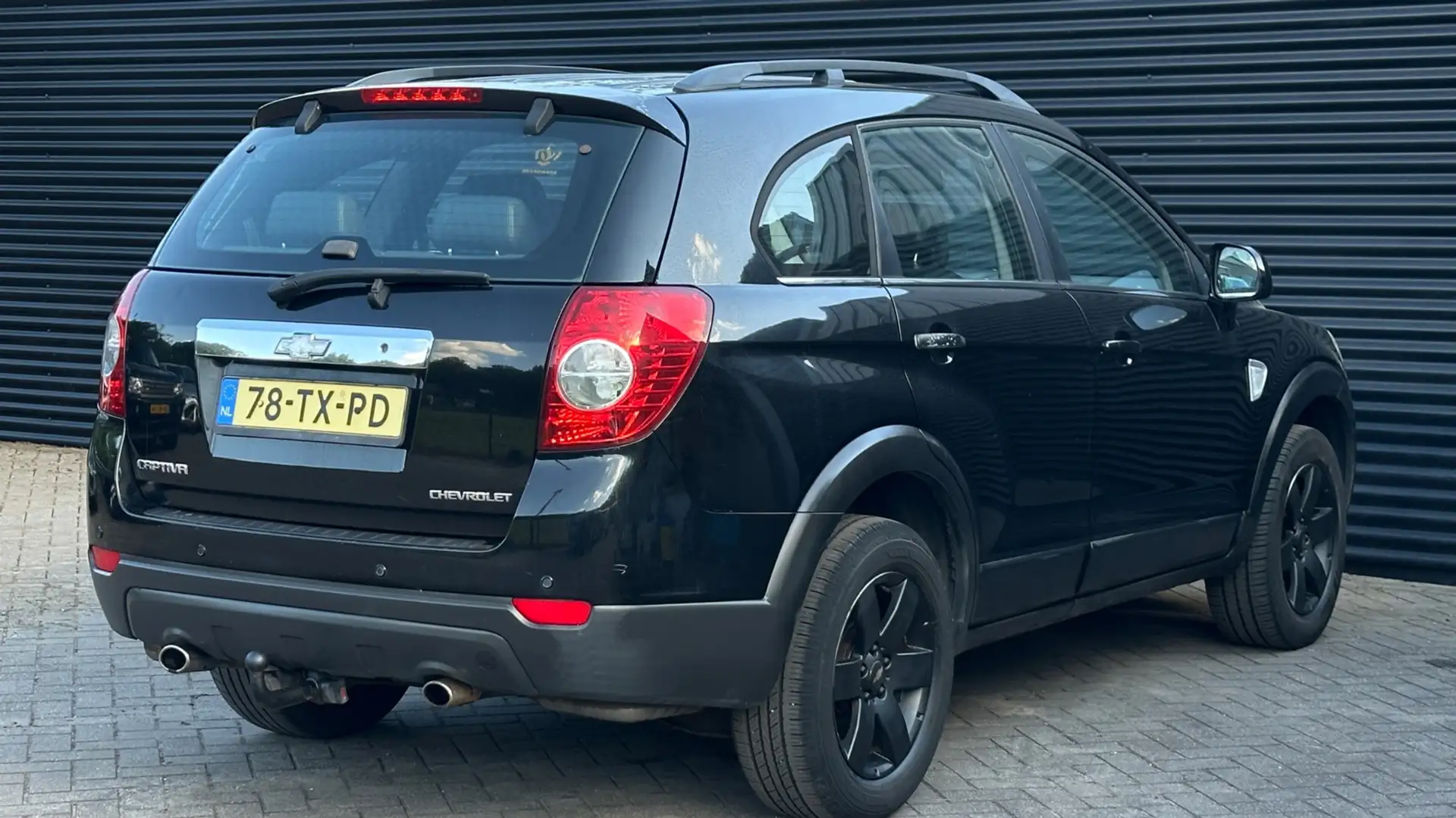 Chevrolet Captiva 2.4i Class | 7 persoons | Airco | Trekhaak | Zwart - 2