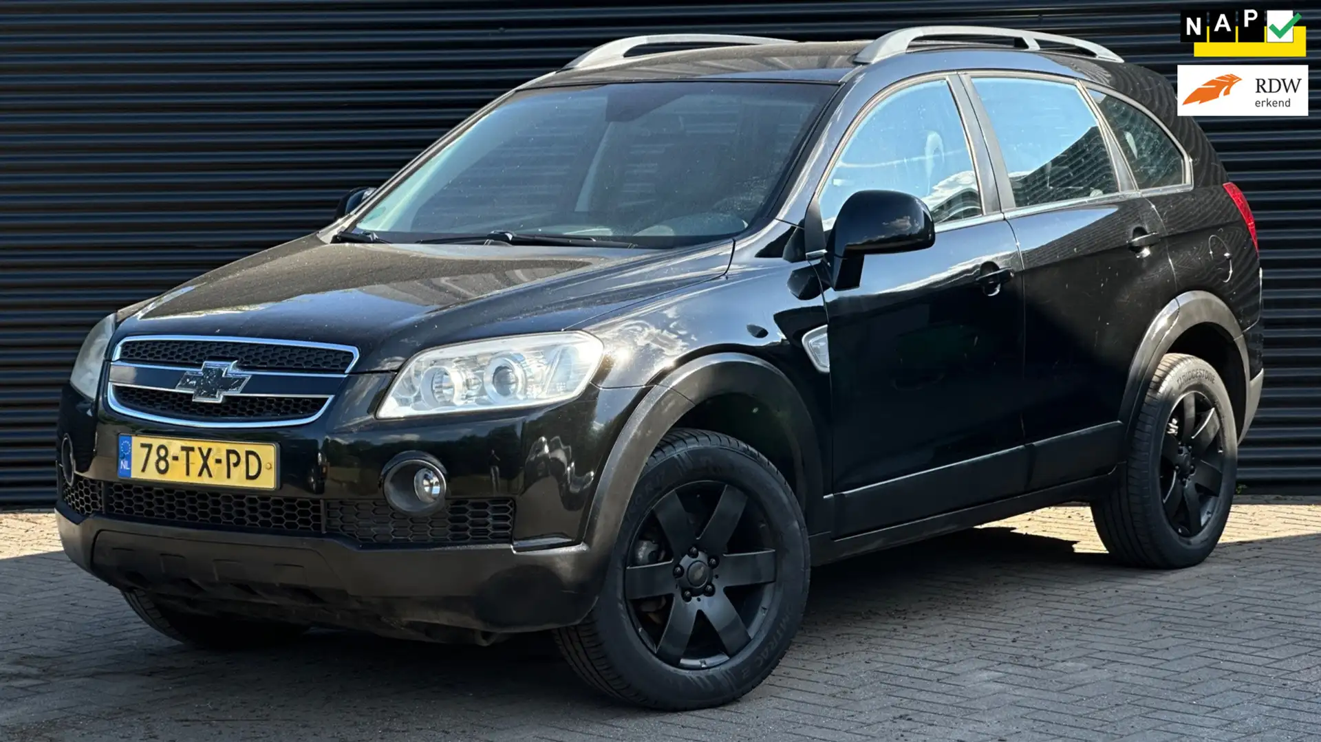 Chevrolet Captiva 2.4i Class | 7 persoons | Airco | Trekhaak | Zwart - 1