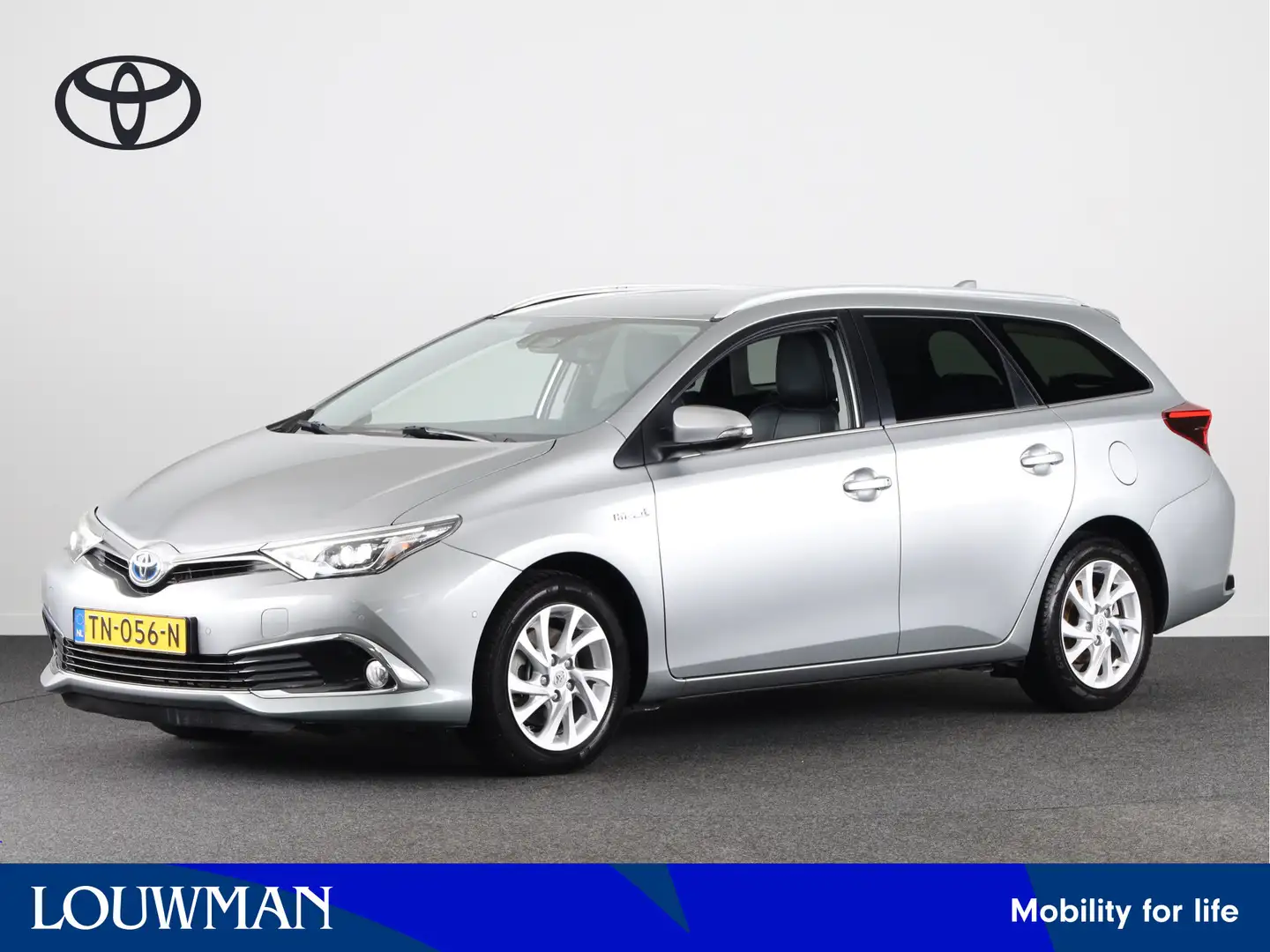 Toyota Auris Touring Sports 1.8 Hybrid Executive | Half lederen Grijs - 1