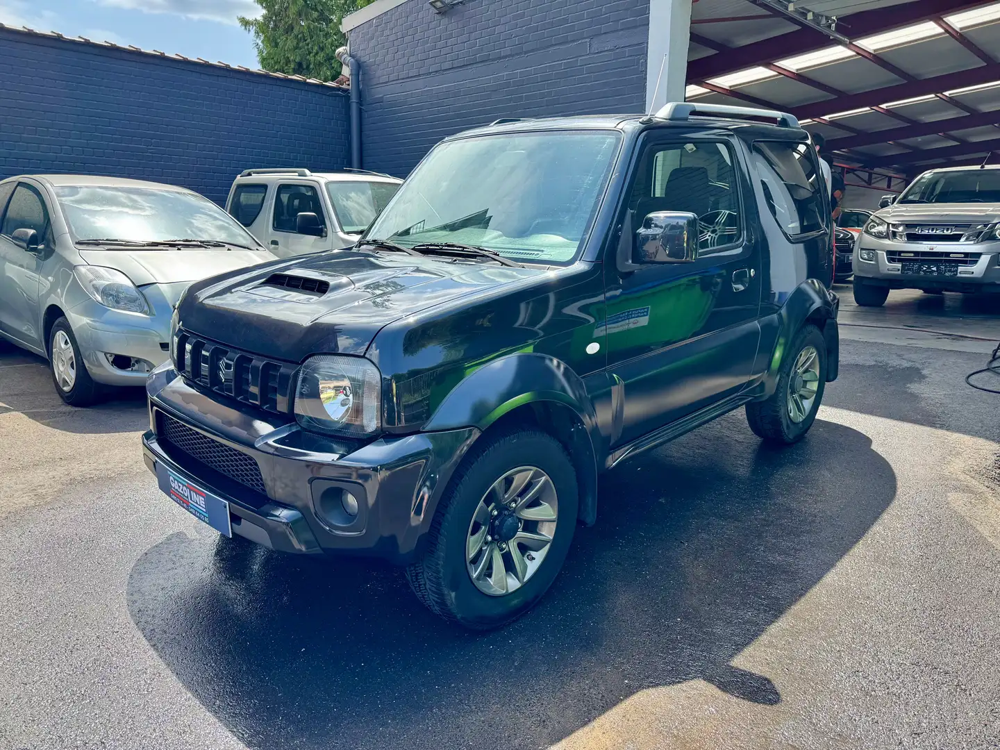 Suzuki Jimny 1.3i JLX Dakota 4 pl avec Historique car pass Noir - 1