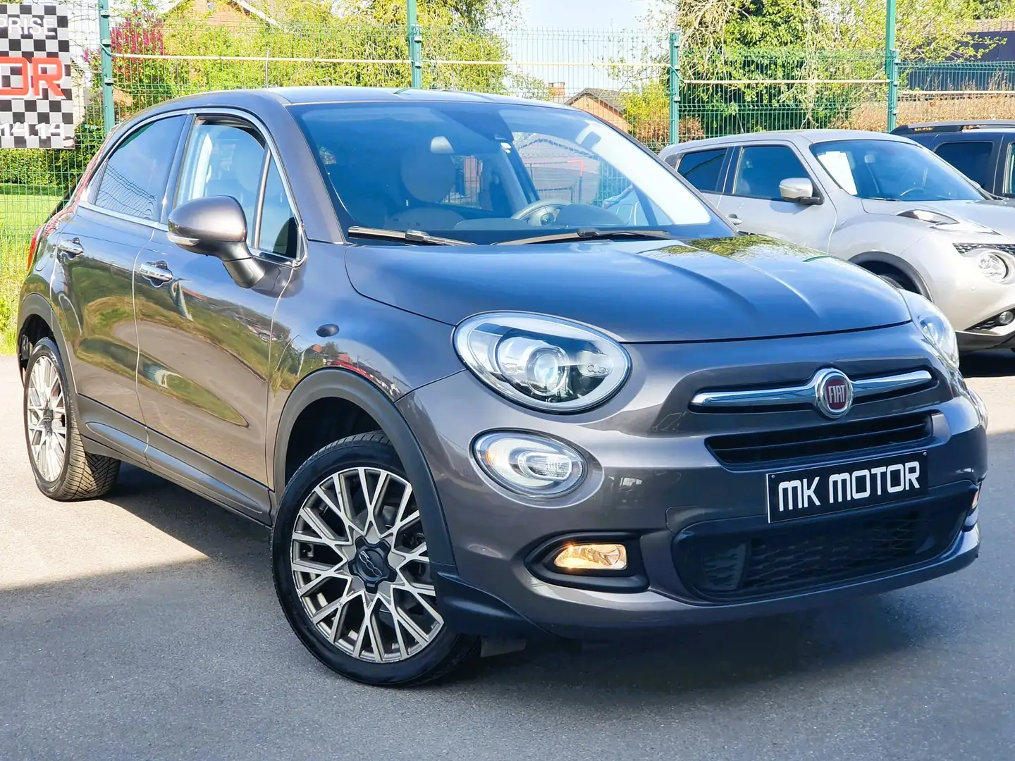 Fiat 500X 🟢1.4 ESSENCE 136CV - GPS - AIRCO Grau - 1