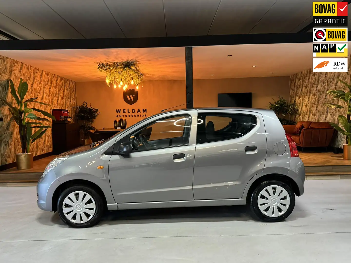 Suzuki Alto 1.0 Comfort EASSS NAP Airco Radio Elek. Ramen Rijk Grijs - 1