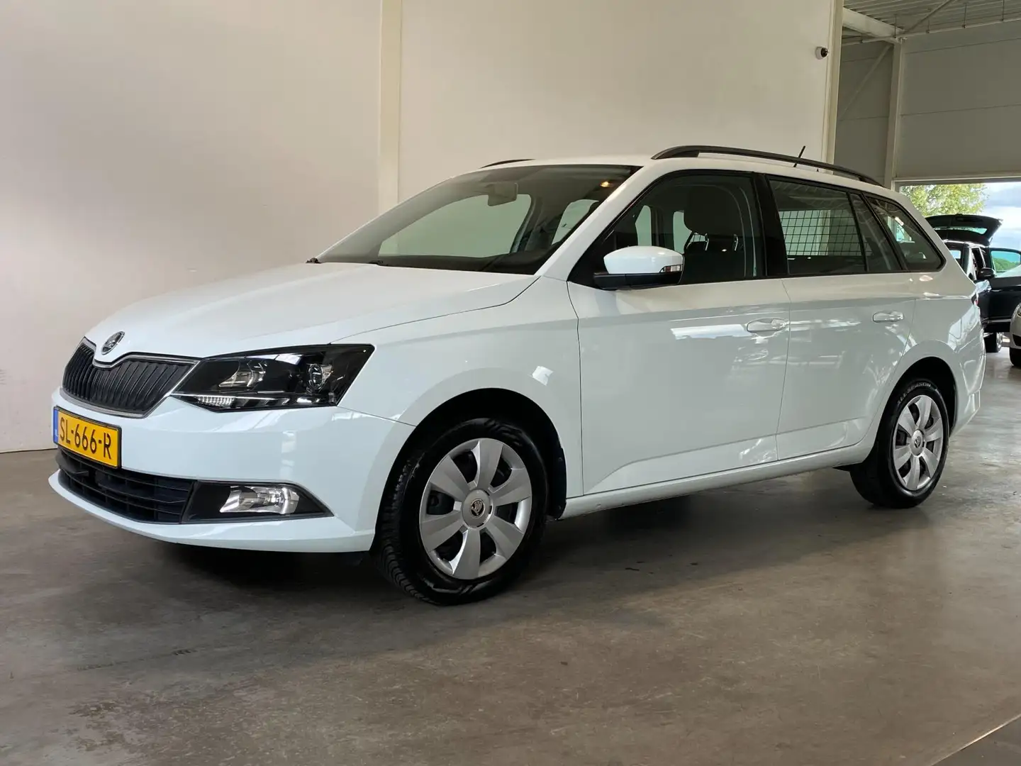 Skoda Fabia Combi 1.0 TSI 95PK Trekhaak NL-auto Wit - 1