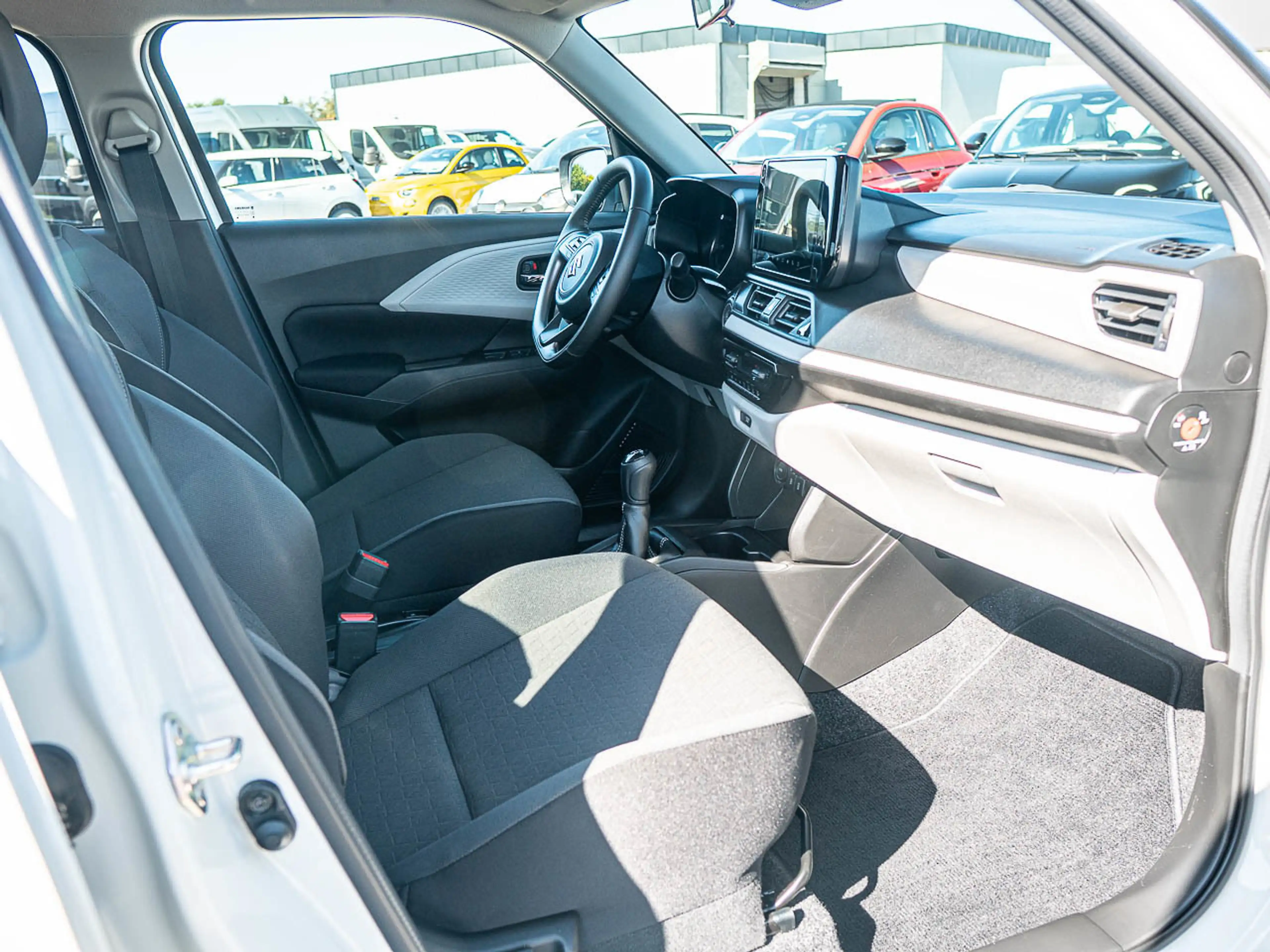 Suzuki Swift Comfort Hybrid — photo 13