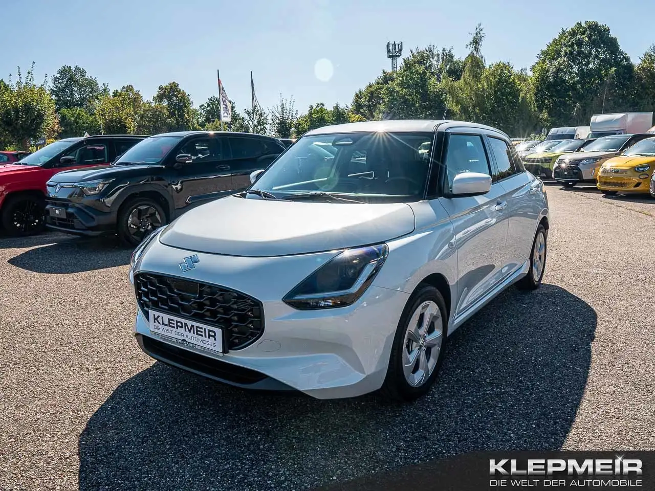 Suzuki Swift Comfort Hybrid — photo 1 of 15