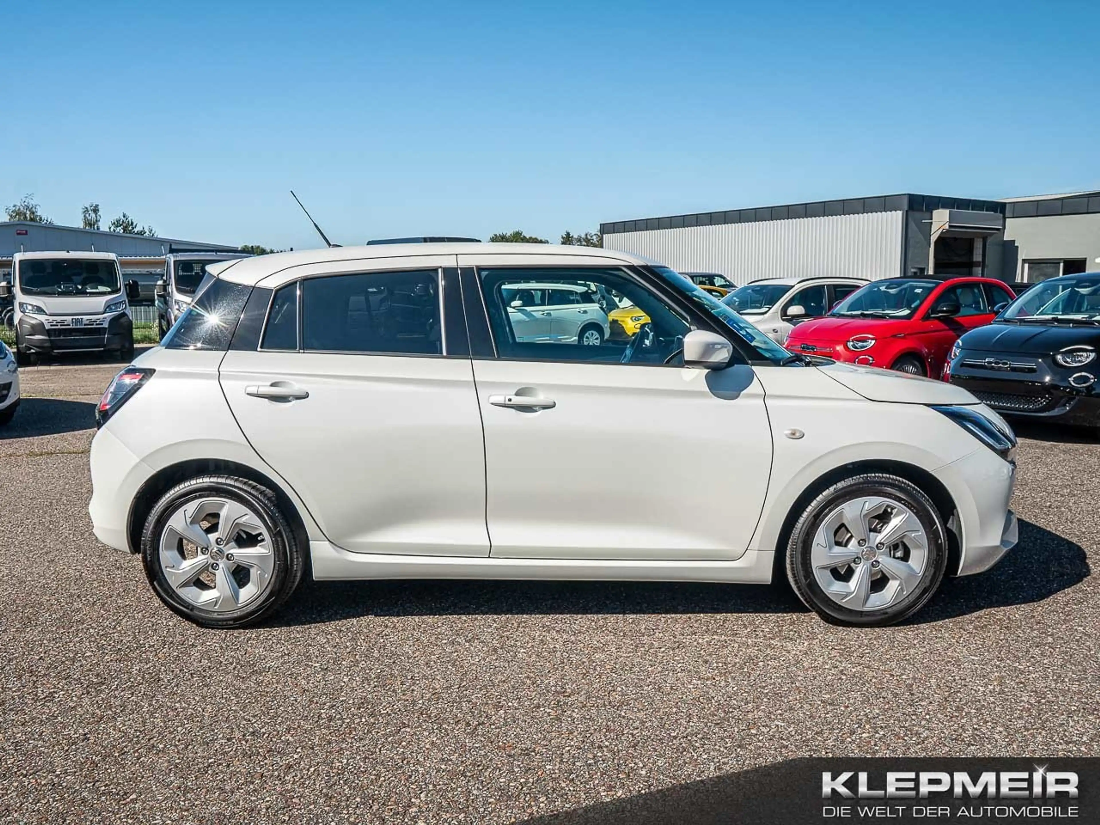 Suzuki Swift Comfort Hybrid — photo 4