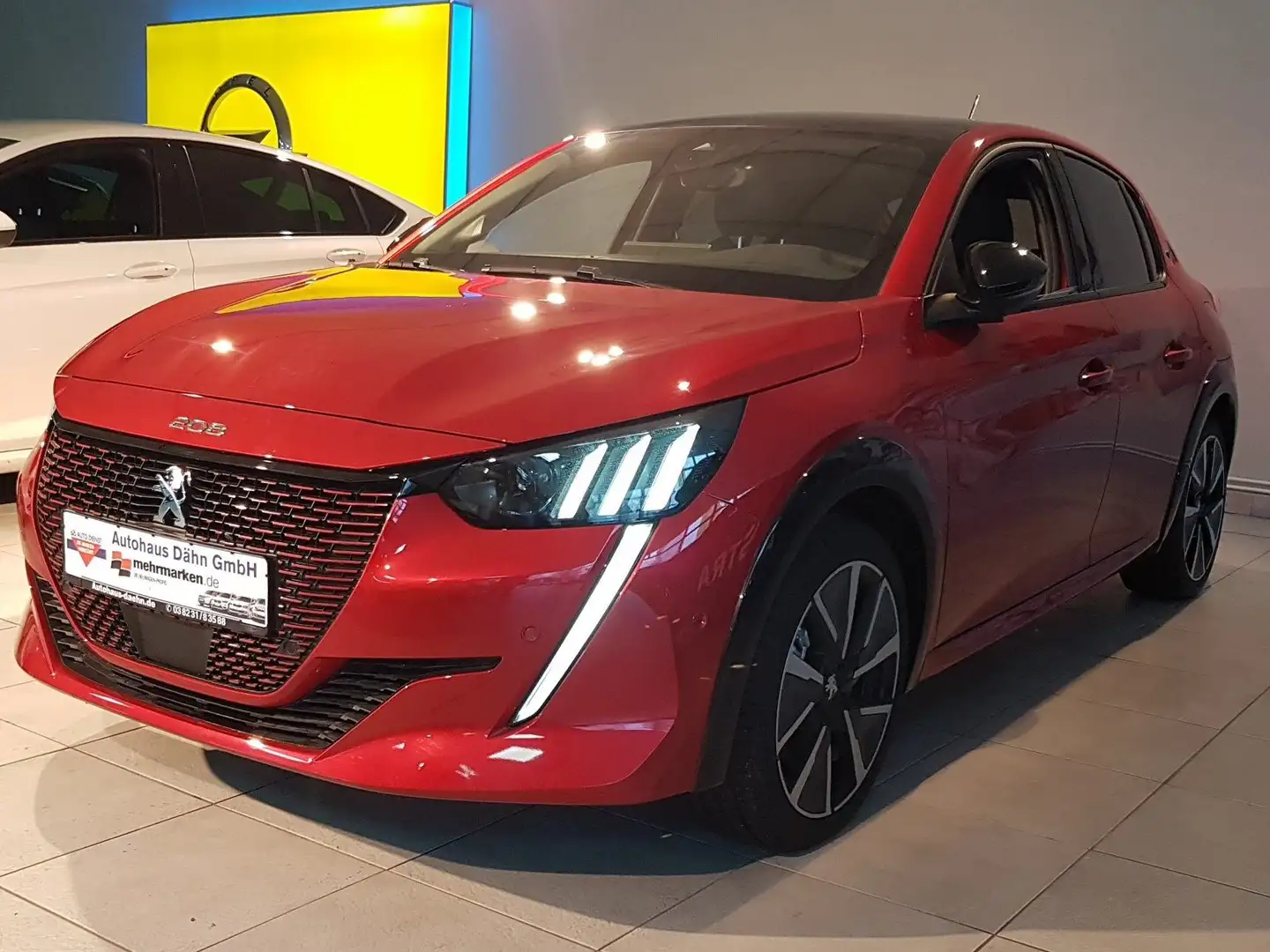 Peugeot e-208 GT - Wallbox, Panoramadach, Navigation, LED Rouge - 1