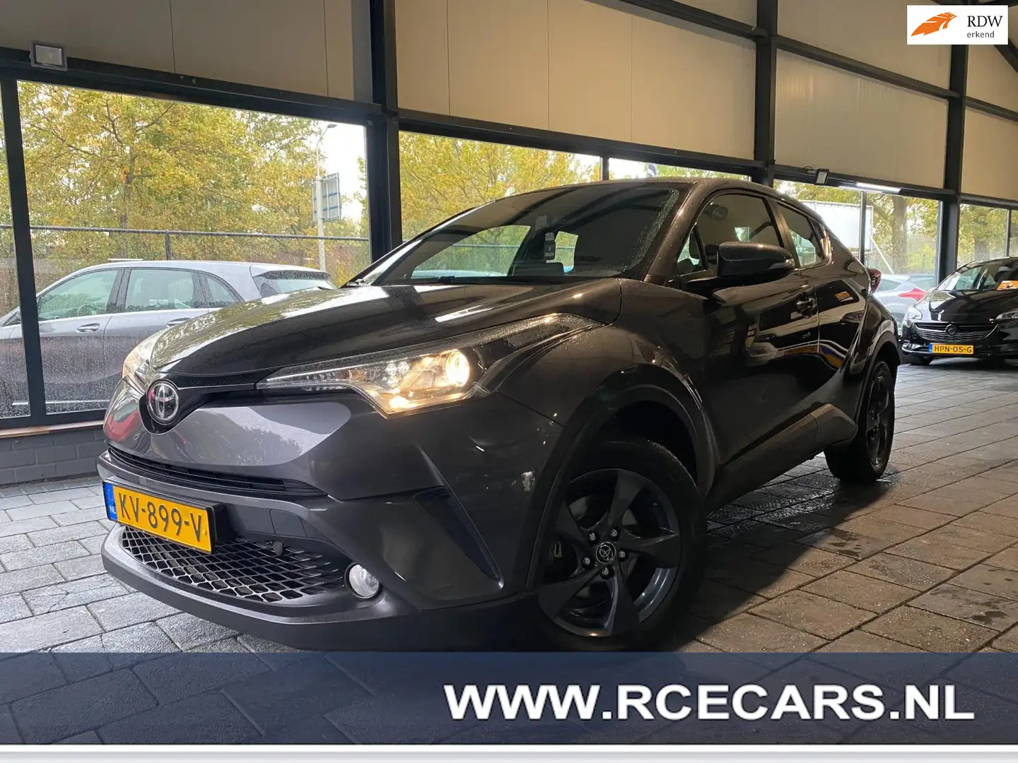 Toyota C-HR 1.2 Dynamic | ACC|Navigatie|Clima|Cruise|Camera|De Gris - 1