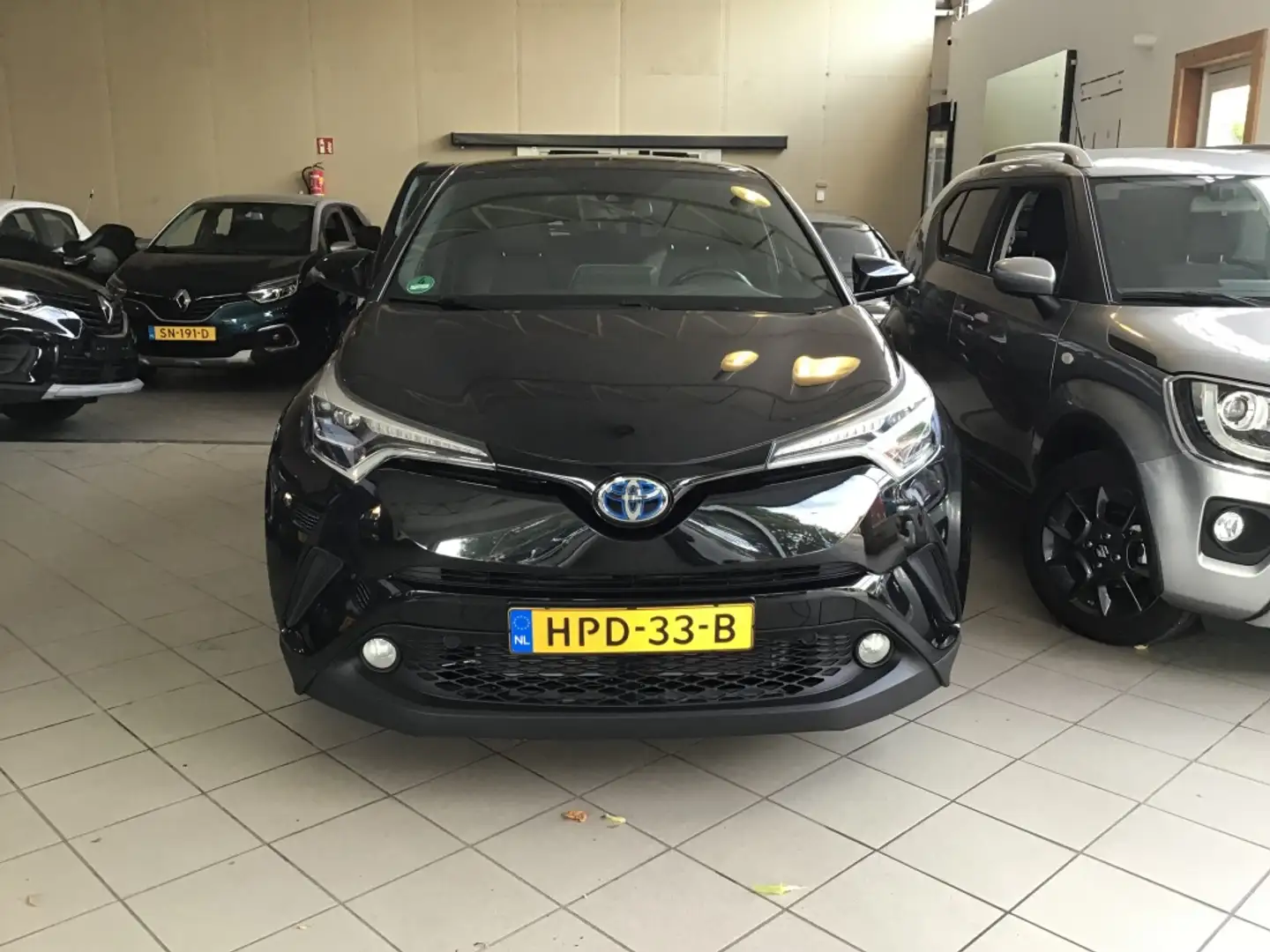 Toyota C-HR 1.8 Hyb. Exec. Ult. Zwart - 1