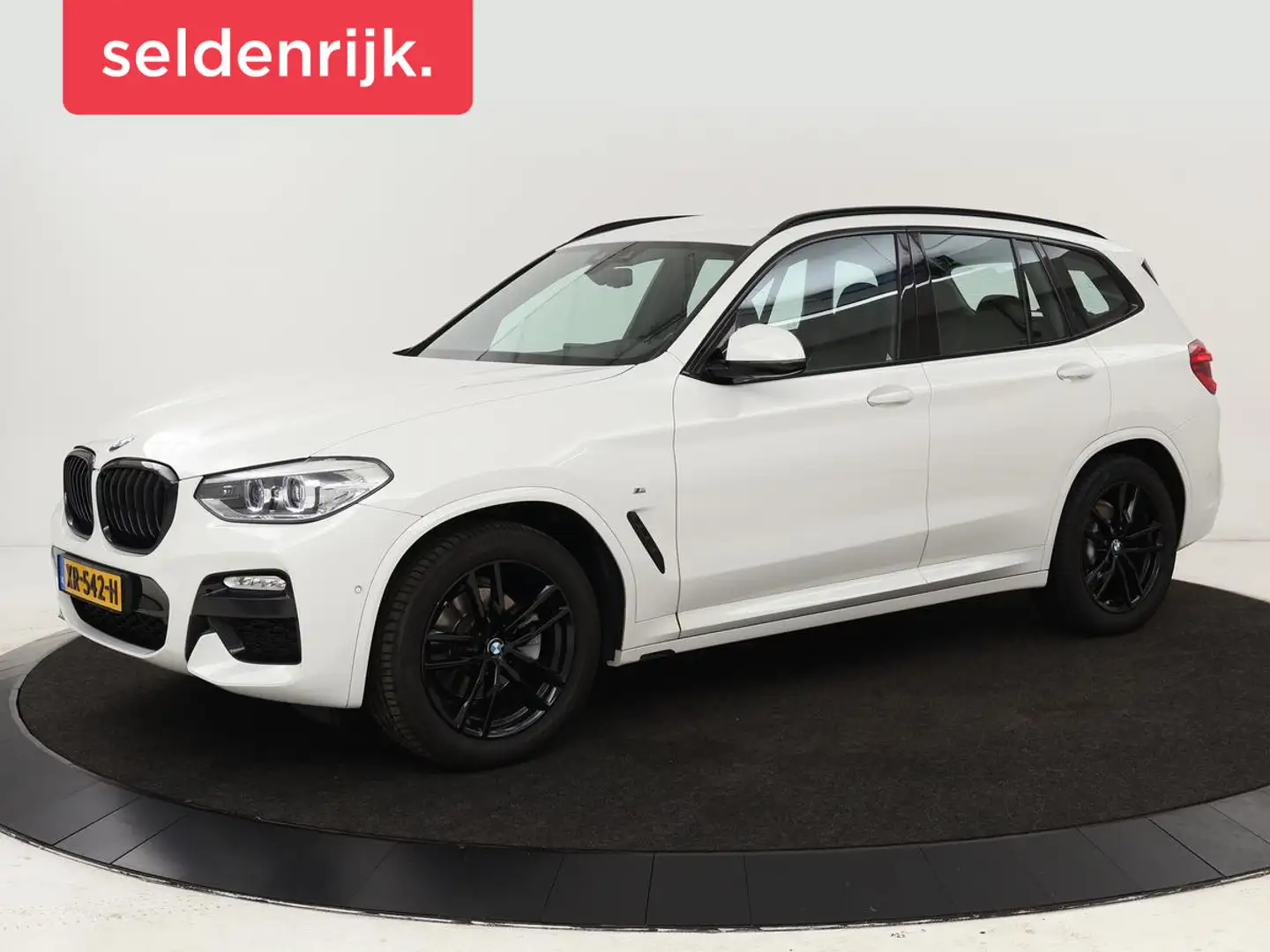 BMW X3 xDrive20i High Executive | M Sport | Leder | Stoel Wit - 1