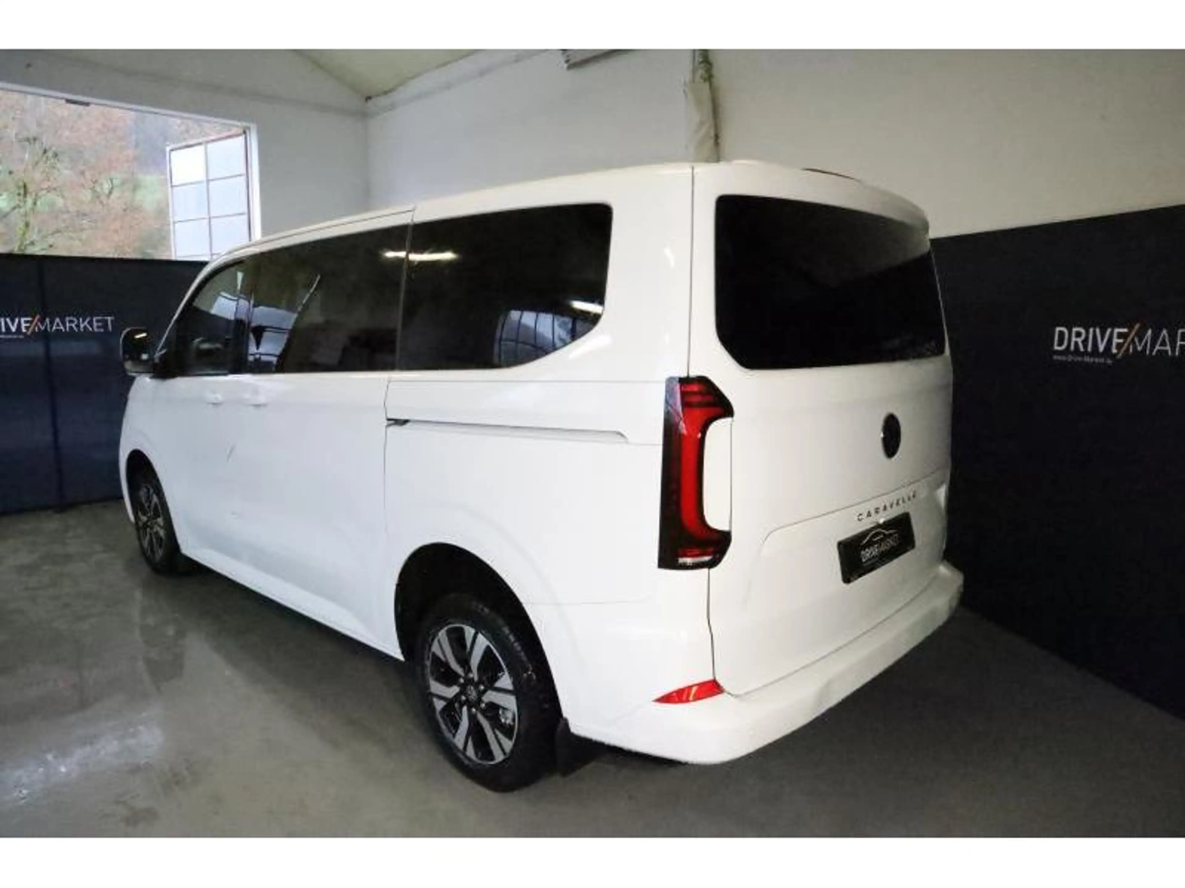 Volkswagen T7 Caravelle STYLE COURT A8 — photo 3